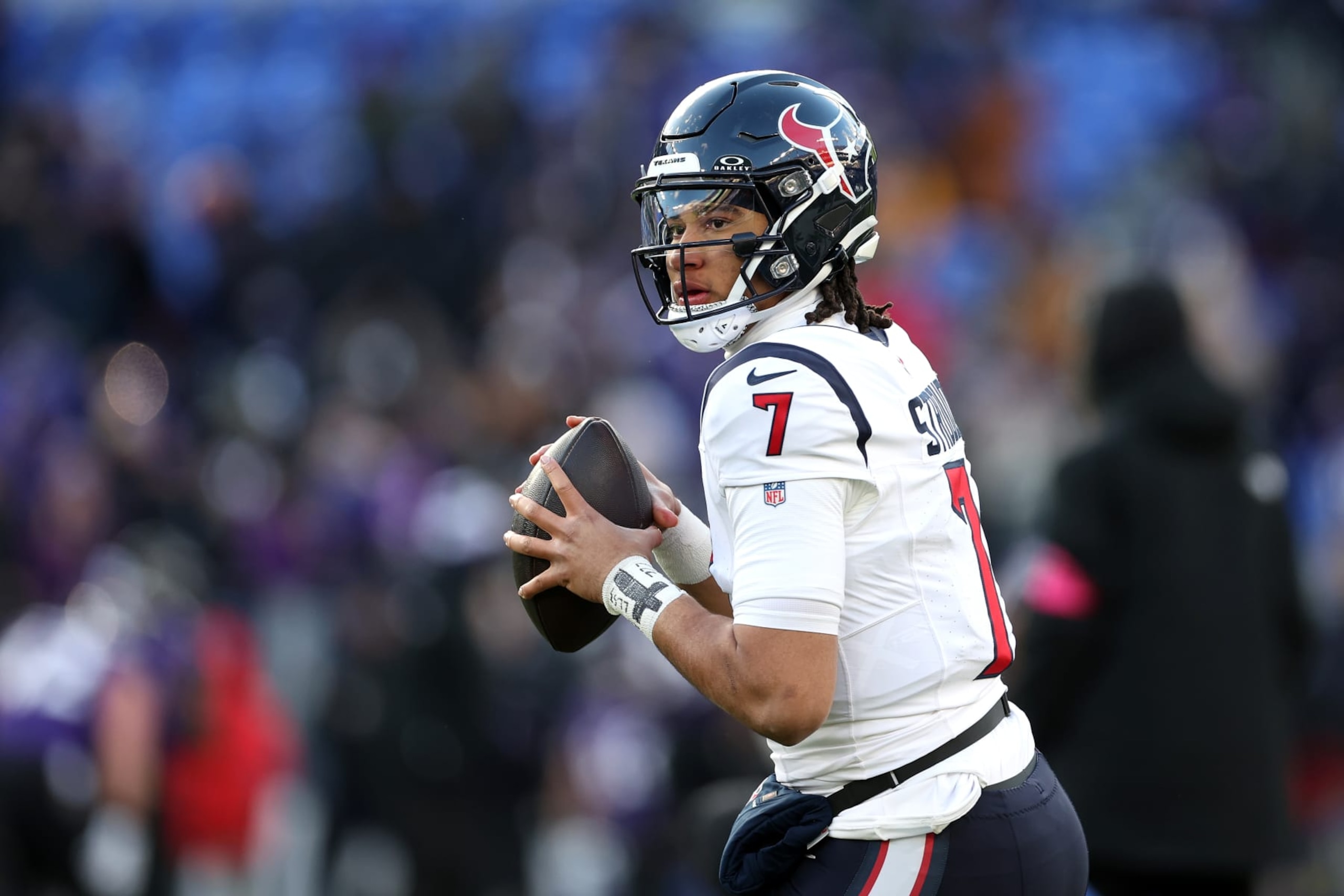 BALTIMORE, MARYLAND - JANUARY 20: Quarterback C.J. Stroud #7 of the Houston Texans warms up before the start of the Texans and Baltimore Ravens AFC Divisional Playoff game at M&T Bank Stadium on January 20, 2024 in Baltimore, Maryland. (Photo by Rob Carr/Getty Images) BALTIMORE, MARYLAND - JANUARY 20: Quarterback C.J. Stroud #7 of the Houston Texans warms up before the start of the Texans and Baltimore Ravens AFC Divisional Playoff game at M&T Bank Stadium on January 20, 2024 in Baltimore, Maryland. (Photo by Rob Carr/Getty Images)