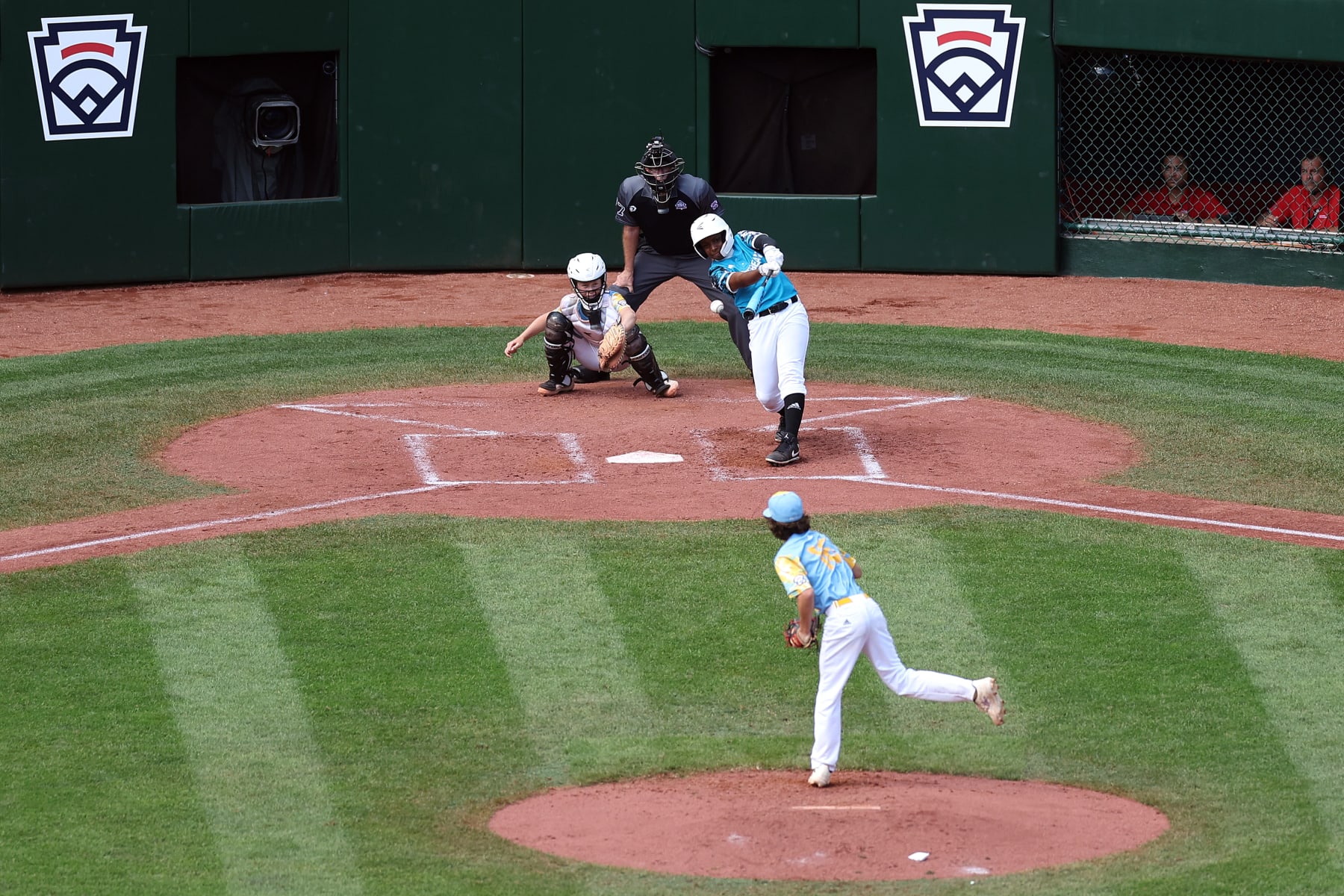 SOUTH WILLIAMSPORT, PENNSYLVANIA - AUGUST 27: Shemar Sophia Jacobus #9 of the Caribbean Region team from Willemstad, Curacao drives an RBI during the third inning against the West Region team from El Segundo, California the Little League World Series Championship Game at Little League International Complex on August 27, 2023 in South Williamsport, Pennsylvania. (Photo by Tim Nwachukwu/Getty Images)