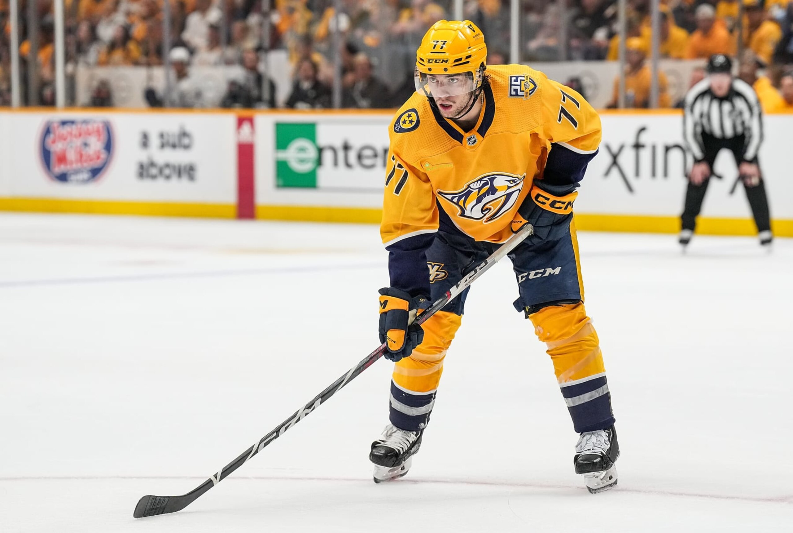 NASHVILLE, TENNESSEE - APRIL 26: Luke Evangelista #77 of the Nashville Predators skates against the Vancouver Canucks in Game Three of the First Round of the 2024 Stanley Cup Playoffs at Bridgestone Arena on April 26, 2024 in Nashville, Tennessee. (Photo by John Russell/NHLI via Getty Images)