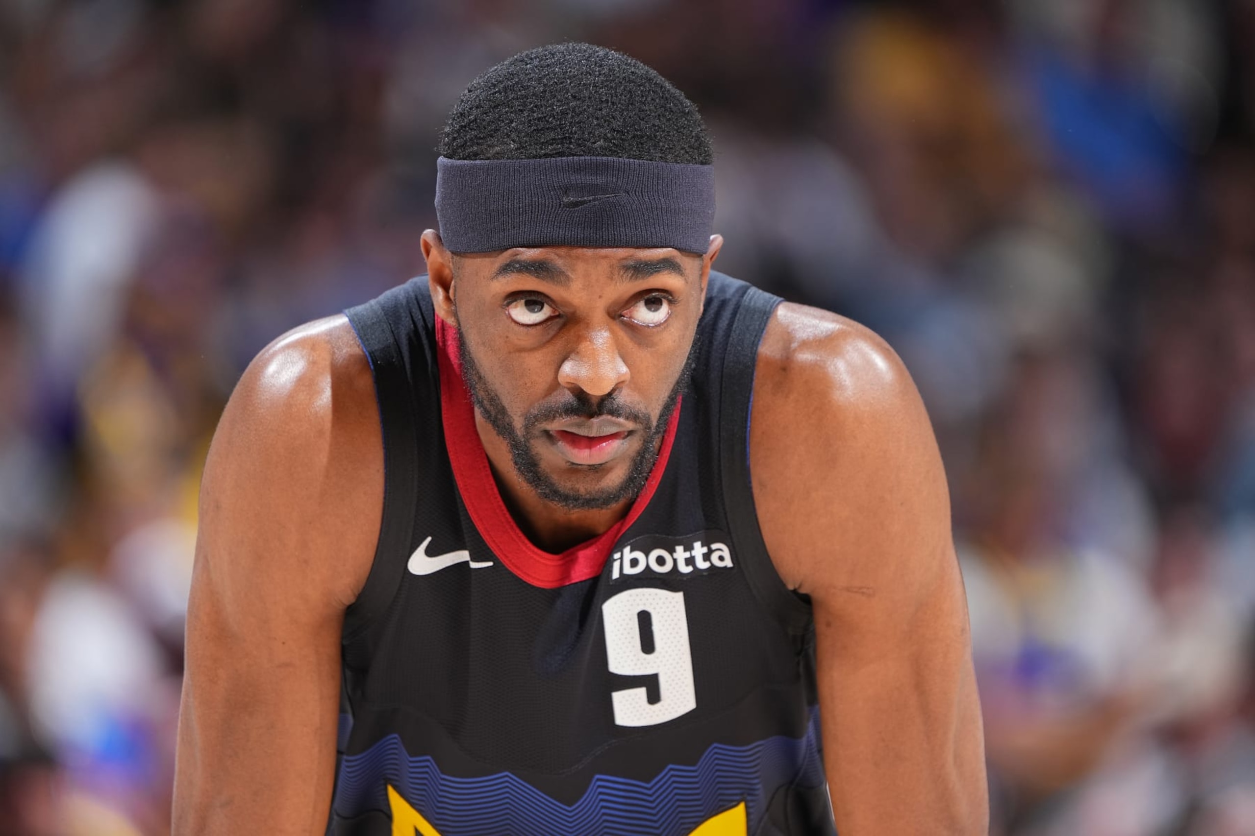 DENVER, CO - APRRIL 22: Justin Holiday #9 of the Denver Nuggets looks on during the game against the Los Angeles Lakers during Round 1 Game 2 of the 2024 NBA Playoffs on April 22, 2024 at the Ball Arena in Denver, Colorado. NOTE TO USER: User expressly acknowledges and agrees that, by downloading and/or using this Photograph, user is consenting to the terms and conditions of the Getty Images License Agreement. Mandatory Copyright Notice: Copyright 2024 NBAE (Photo by Garrett Ellwood/NBAE via Getty Images)