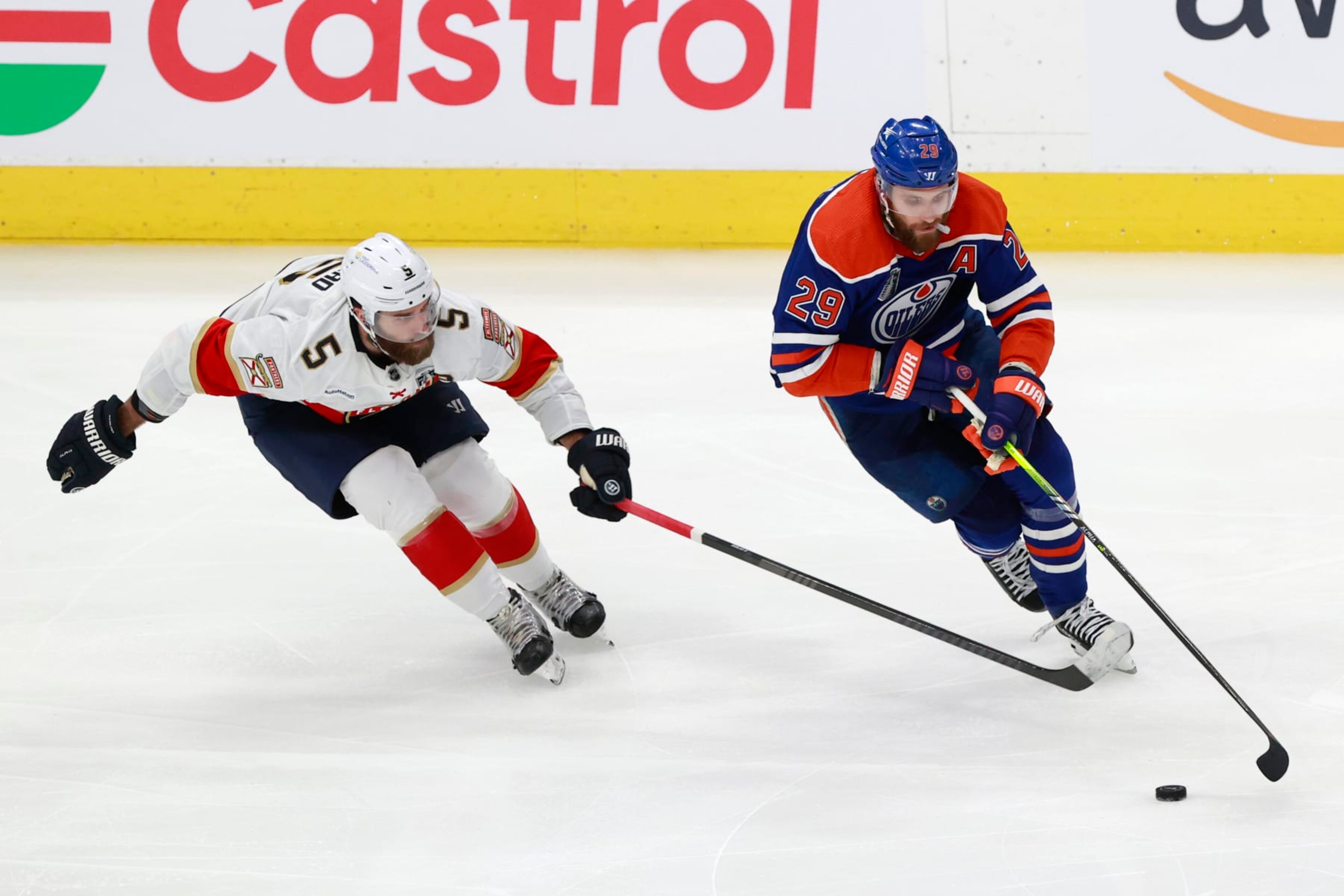 EDMONTON, ALBERTA - JUNE 21: Leon Draisaitl #29 of the Edmonton Oilers skates past Aaron Ekblad #5 of the Florida Panthers during the second period of Game Six of the 2024 Stanley Cup Final at Rogers Place on June 21, 2024 in Edmonton, Alberta. (Photo by Jeff Vinnick/Getty Images) EDMONTON, ALBERTA - JUNE 21: Leon Draisaitl #29 of the Edmonton Oilers skates past Aaron Ekblad #5 of the Florida Panthers during the second period of Game Six of the 2024 Stanley Cup Final at Rogers Place on June 21, 2024 in Edmonton, Alberta. (Photo by Jeff Vinnick/Getty Images)