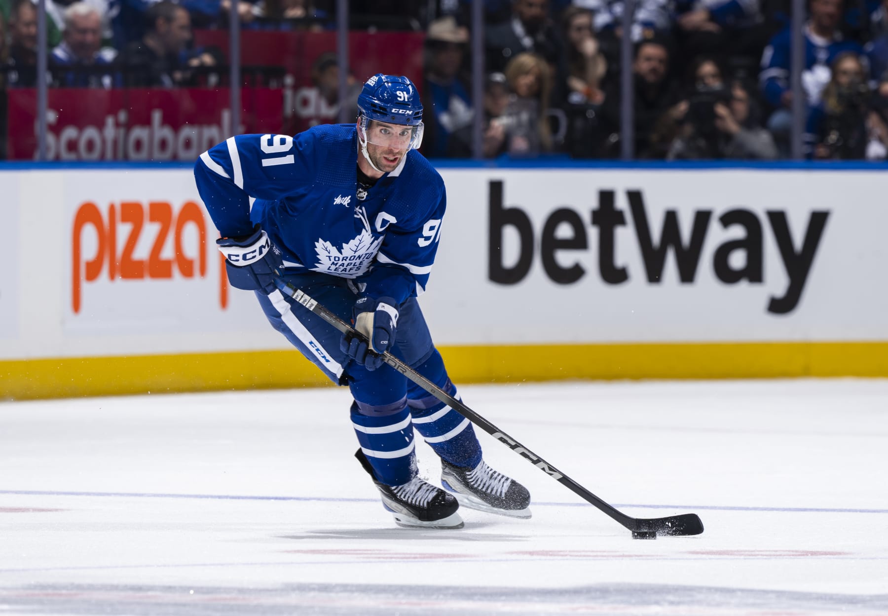 TORONTO, ON - APRIL 24: John Tavares #91 of the Toronto Maple Leafs skates ]against the Boston Bruins during the second period in Game Three of the First Round of the 2024 Stanley Cup Playoffs at Scotiabank Arena on April 24, 2024 in Toronto, Ontario, Canada. (Photo by Mark Blinch/NHLI via Getty Images)