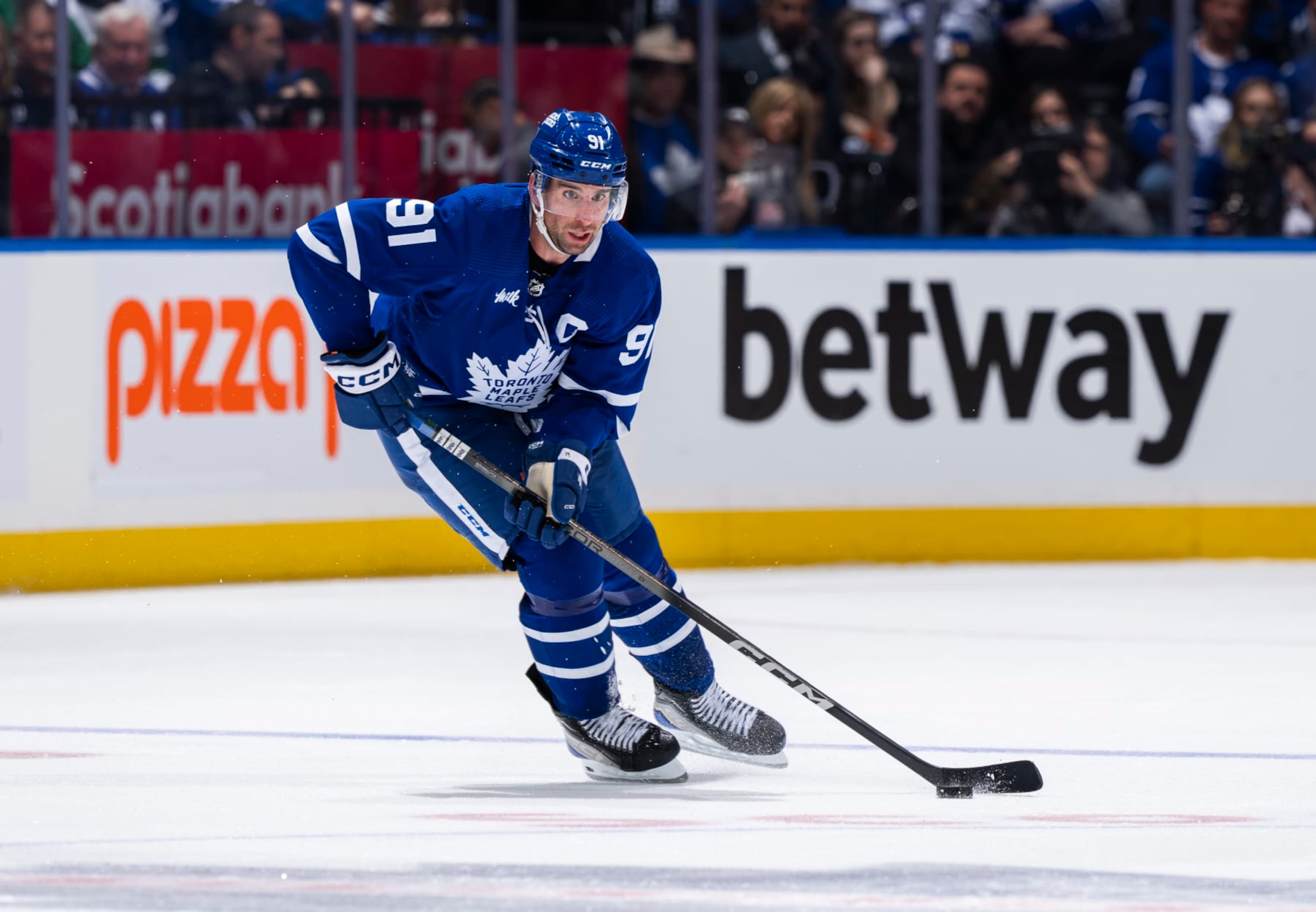 TORONTO, ON - APRIL 24: John Tavares #91 of the Toronto Maple Leafs skates ]against the Boston Bruins during the second period in Game Three of the First Round of the 2024 Stanley Cup Playoffs at Scotiabank Arena on April 24, 2024 in Toronto, Ontario, Canada. (Photo by Mark Blinch/NHLI via Getty Images)