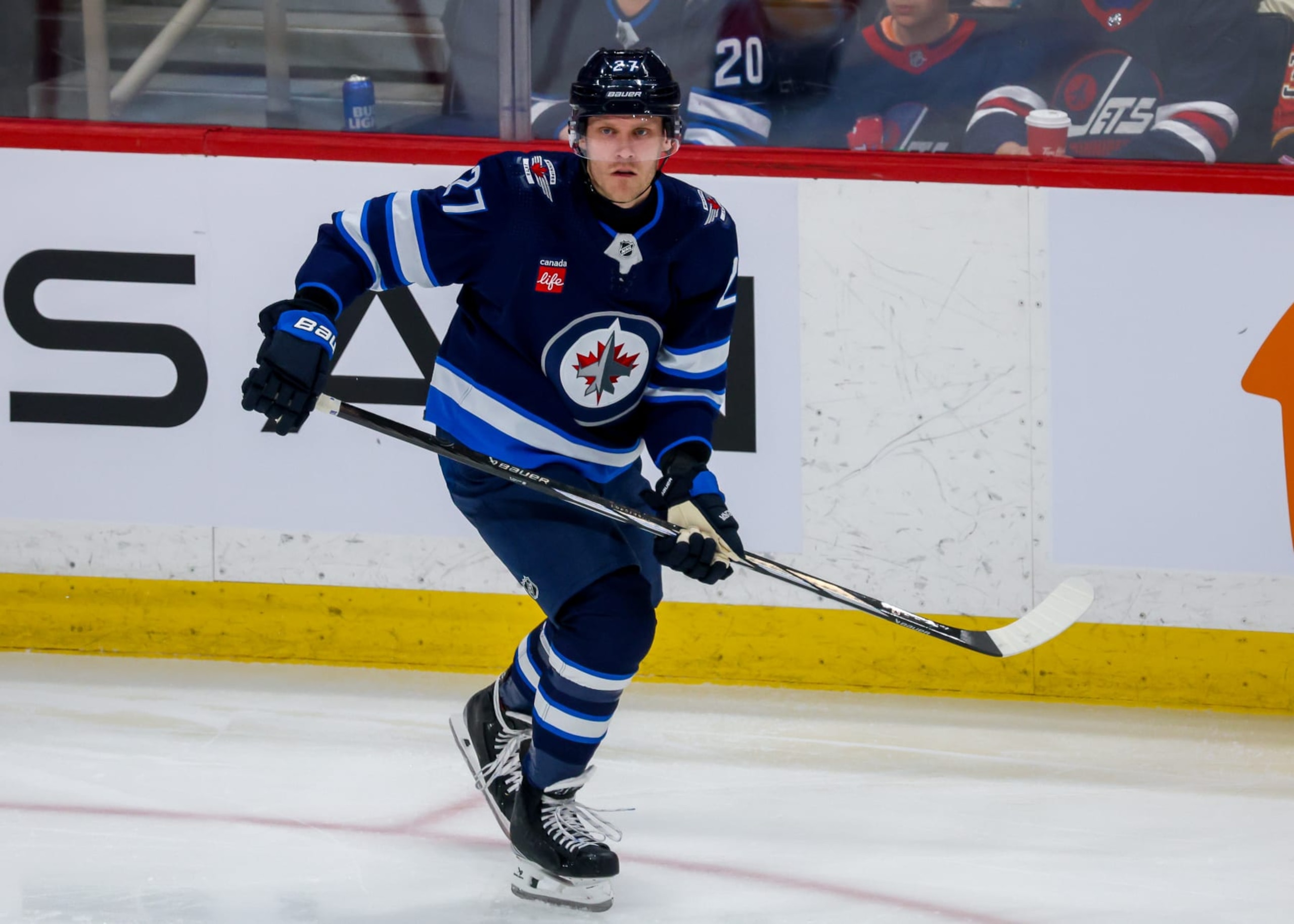 WINNIPEG, CANADA - APRIL 04: Nikolaj Ehlers #27 of the Winnipeg Jets skates during third period action against the Calgary Flames at Canada Life Centre on April 04, 2024 in Winnipeg, Manitoba, Canada. (Photo by Jonathan Kozub/NHLI via Getty Images)