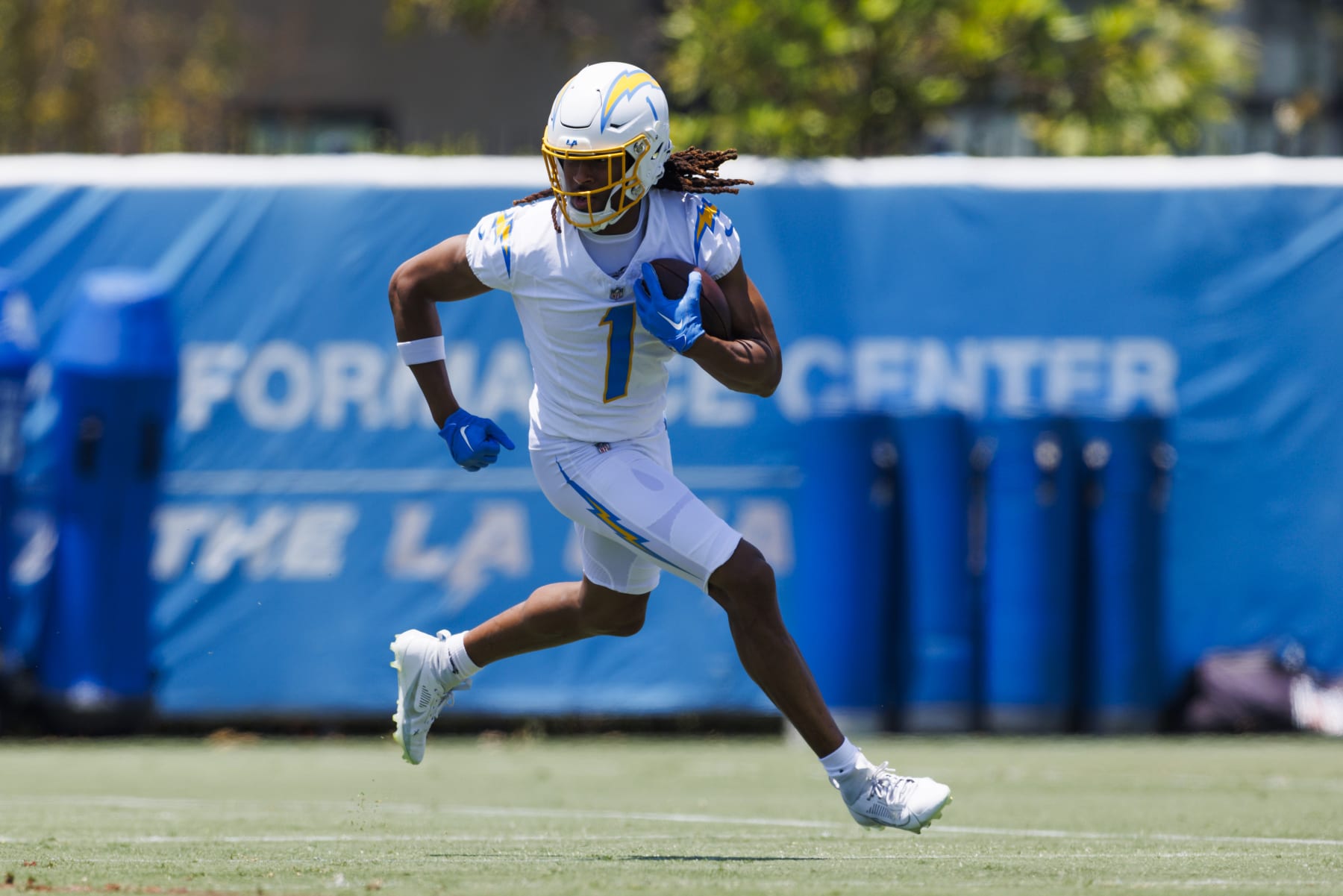 COSTA MESA, CALIFORNIA - MAY 29: Quentin Johnston #1 of the Los Angeles Chargers runs after the catch during an NFL football organized team activity at Hoag Performance Center on May 29, 2024 in Costa Mesa, California. (Photo by Ric Tapia/Getty Images)