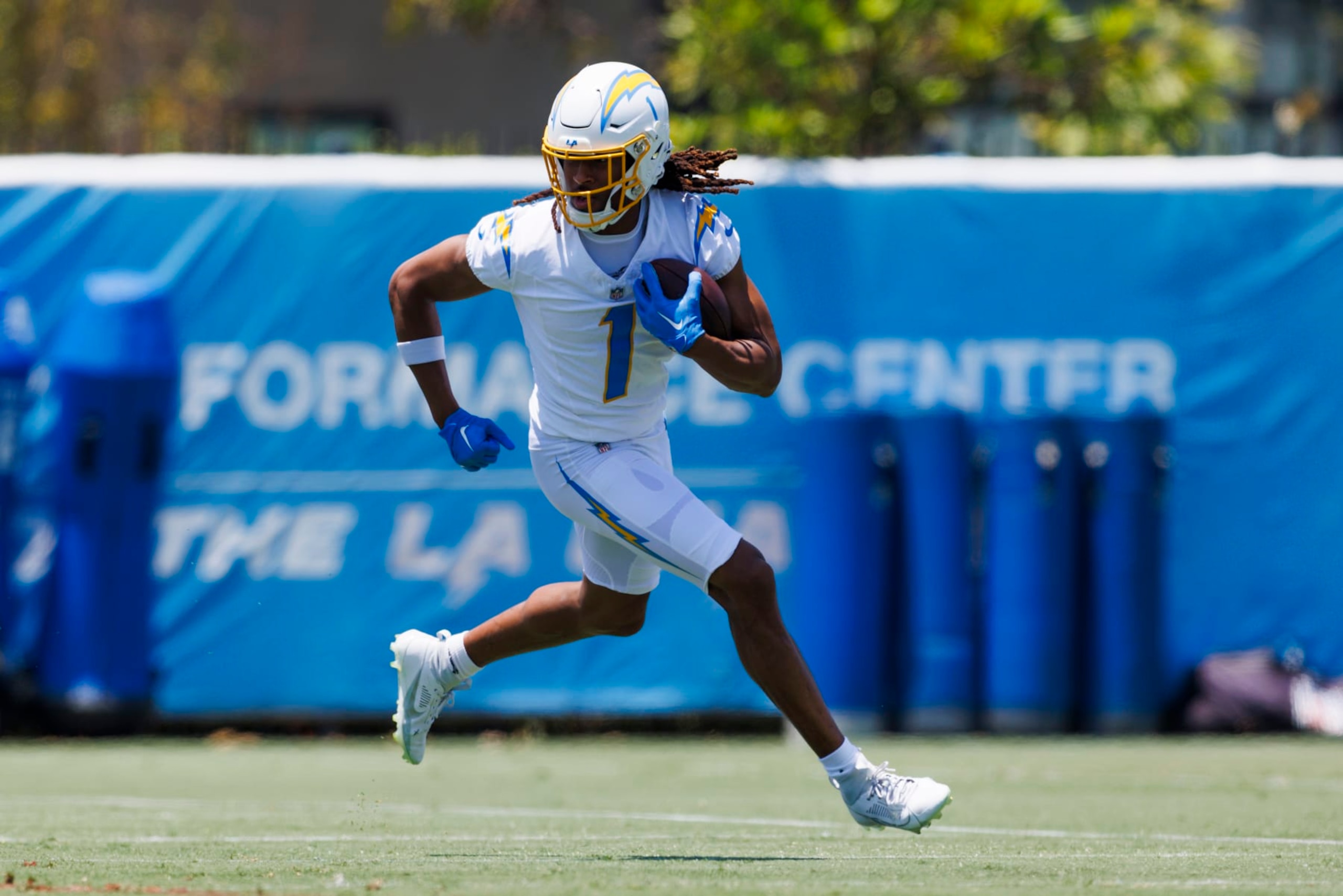 COSTA MESA, CALIFORNIA - MAY 29: Quentin Johnston #1 of the Los Angeles Chargers runs after the catch during an NFL football organized team activity at Hoag Performance Center on May 29, 2024 in Costa Mesa, California. (Photo by Ric Tapia/Getty Images)