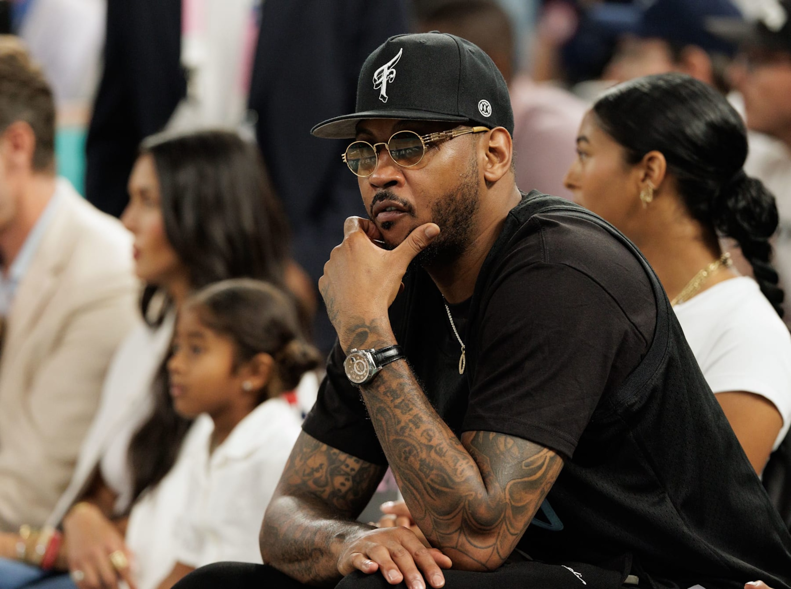 Former NBA player Carmelo Anthony attends the Women's Gold Medal game between Team France and Team United States on day sixteen of the Olympic Games Paris 2024 at Bercy Arena on August 11, 2024 in Paris, France. (Photo by Tnani Badreddine/DeFodi Images via Getty Images)