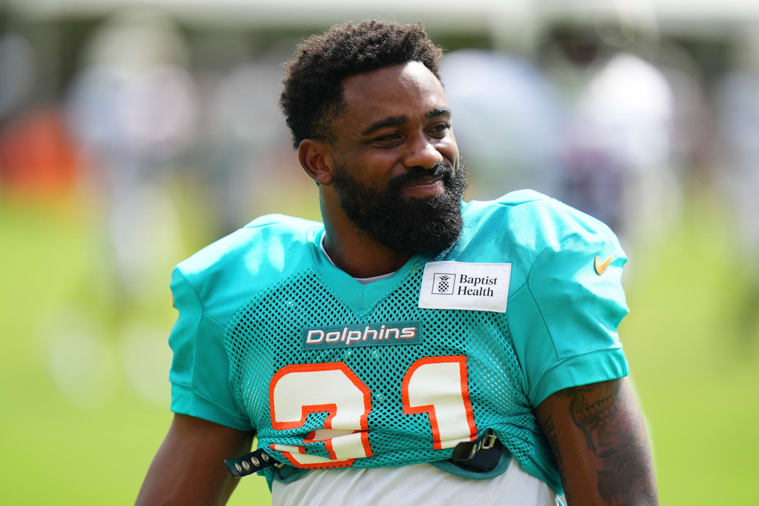 MIAMI GARDENS, FLORIDA - AUGUST 07: Raheem Mostert #31 of the Miami Dolphins looks on during training camp practice with the Atlanta Falcons on August 07, 2024 in Miami Gardens, Florida. (Photo by Rich Storry/Getty Images)
