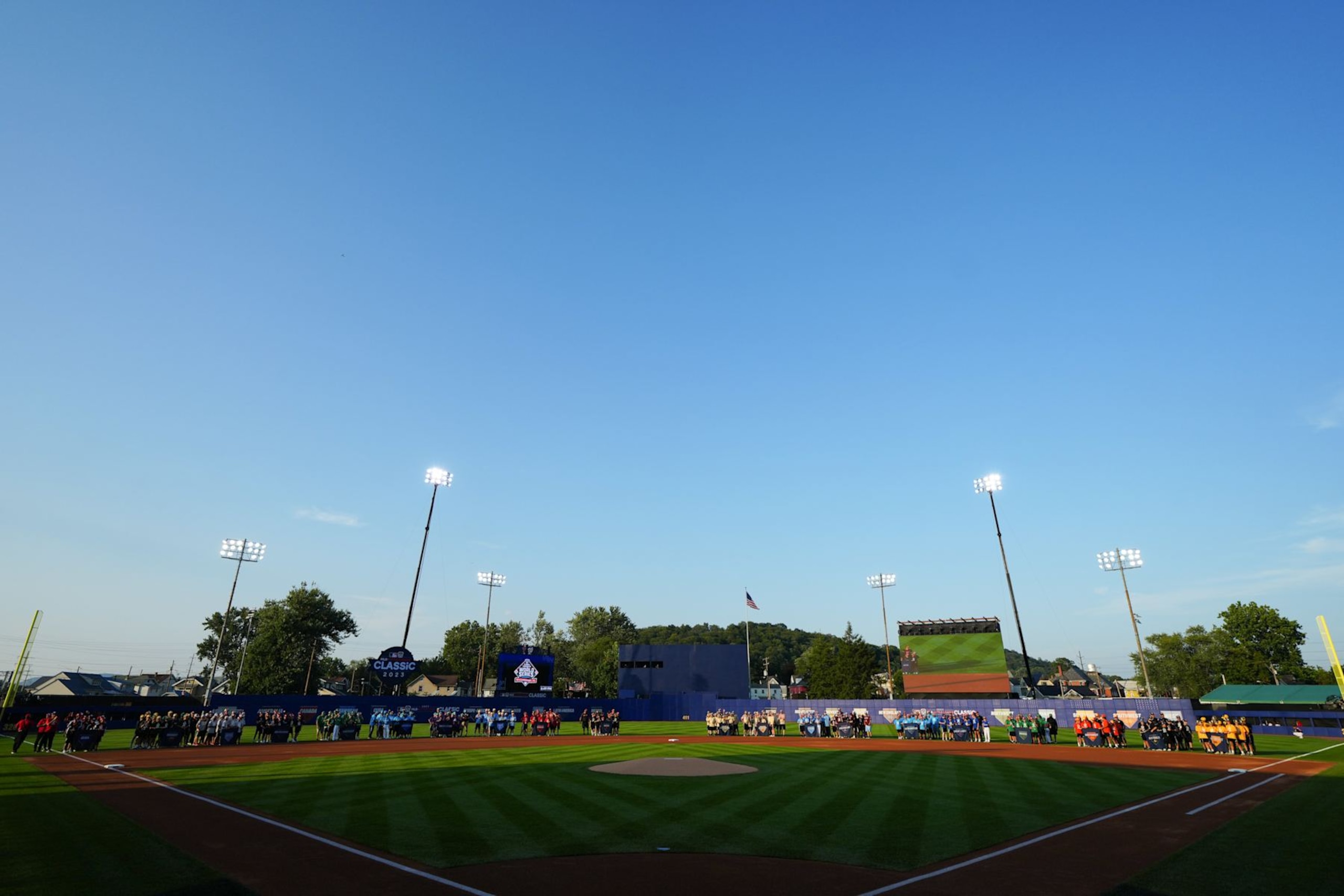 SOUTH WILLIAMSPORT, PA  - AUGUST 20:   Little League World Series teams line up on the field prior to the game between the Philadelphia Phillies and the Washington Nationals at Muncy Bank Ballpark at Historic Bowman Field on Sunday, August 20, 2023 in South Williamsport, Pennsylvania. (Photo by Daniel Shirey/MLB Photos via Getty Images)