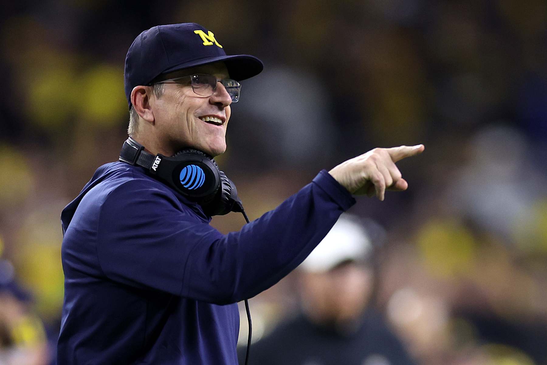 HOUSTON, TEXAS - JANUARY 08: Head coach Jim Harbaugh of the Michigan Wolverines looks on in the first half against the Washington Huskies during the 2024 CFP National Championship game at NRG Stadium on January 08, 2024 in Houston, Texas. (Photo by Maddie Meyer/Getty Images) HOUSTON, TEXAS - JANUARY 08: Head coach Jim Harbaugh of the Michigan Wolverines looks on in the first half against the Washington Huskies during the 2024 CFP National Championship game at NRG Stadium on January 08, 2024 in Houston, Texas. (Photo by Maddie Meyer/Getty Images)