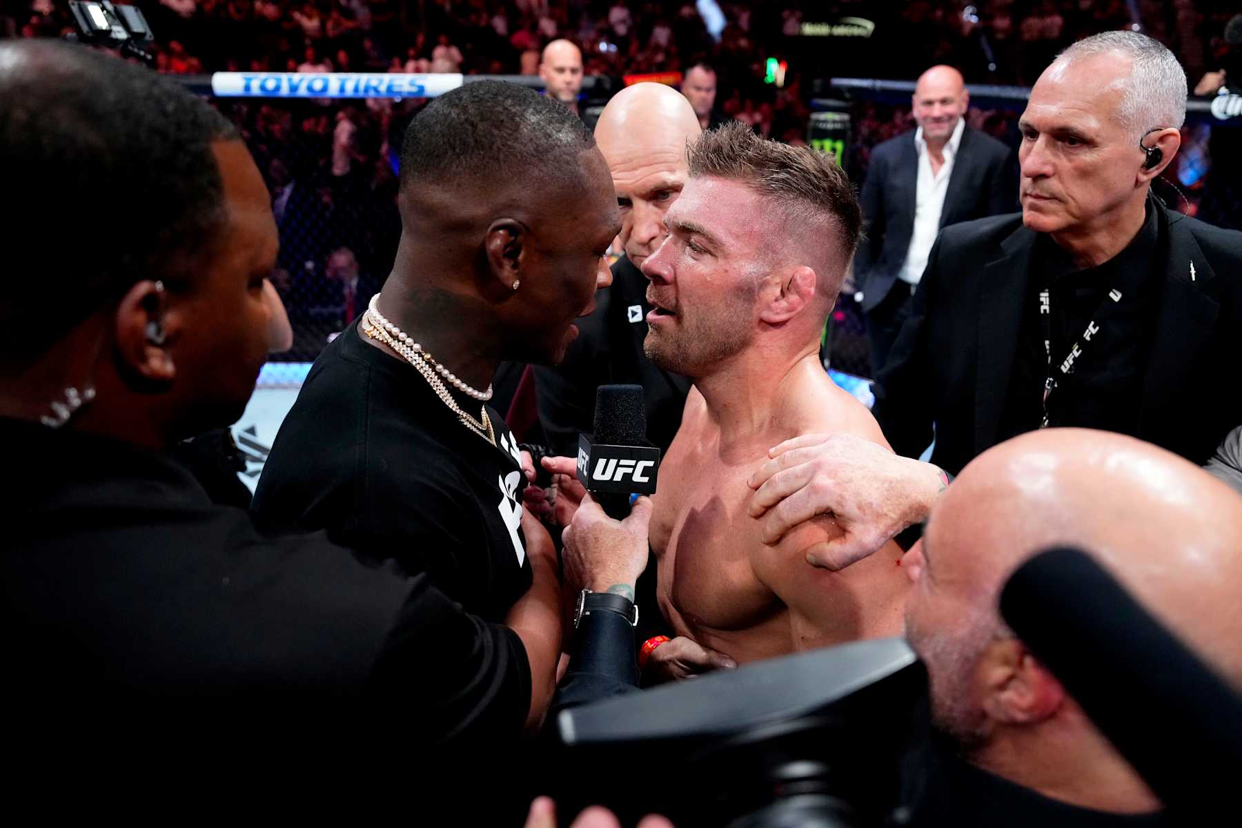 Adesanya (left) faces off with Du Plessis in the Octagon in July 2023.