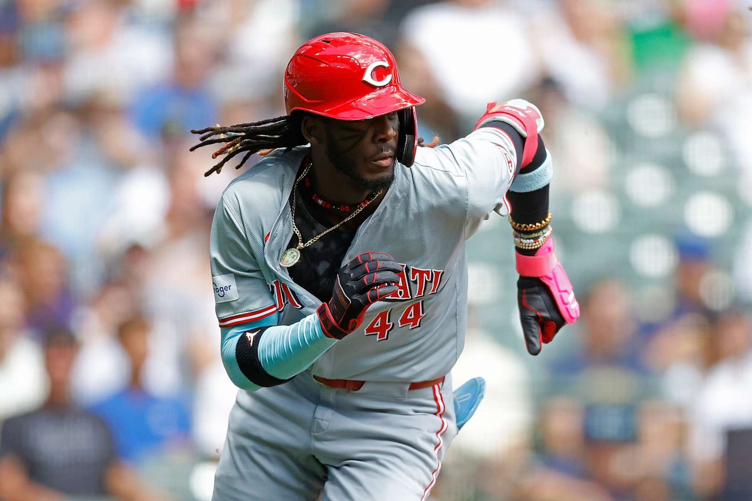 MILWAUKEE, WISCONSIN - AUGUST 11: Elly De La Cruz #44 of the Cincinnati Reds takes off running after the swing during the game against the Milwaukee Brewers at American Family Field on August 11, 2024 in Milwaukee, Wisconsin. (Photo by John Fisher/Getty Images)