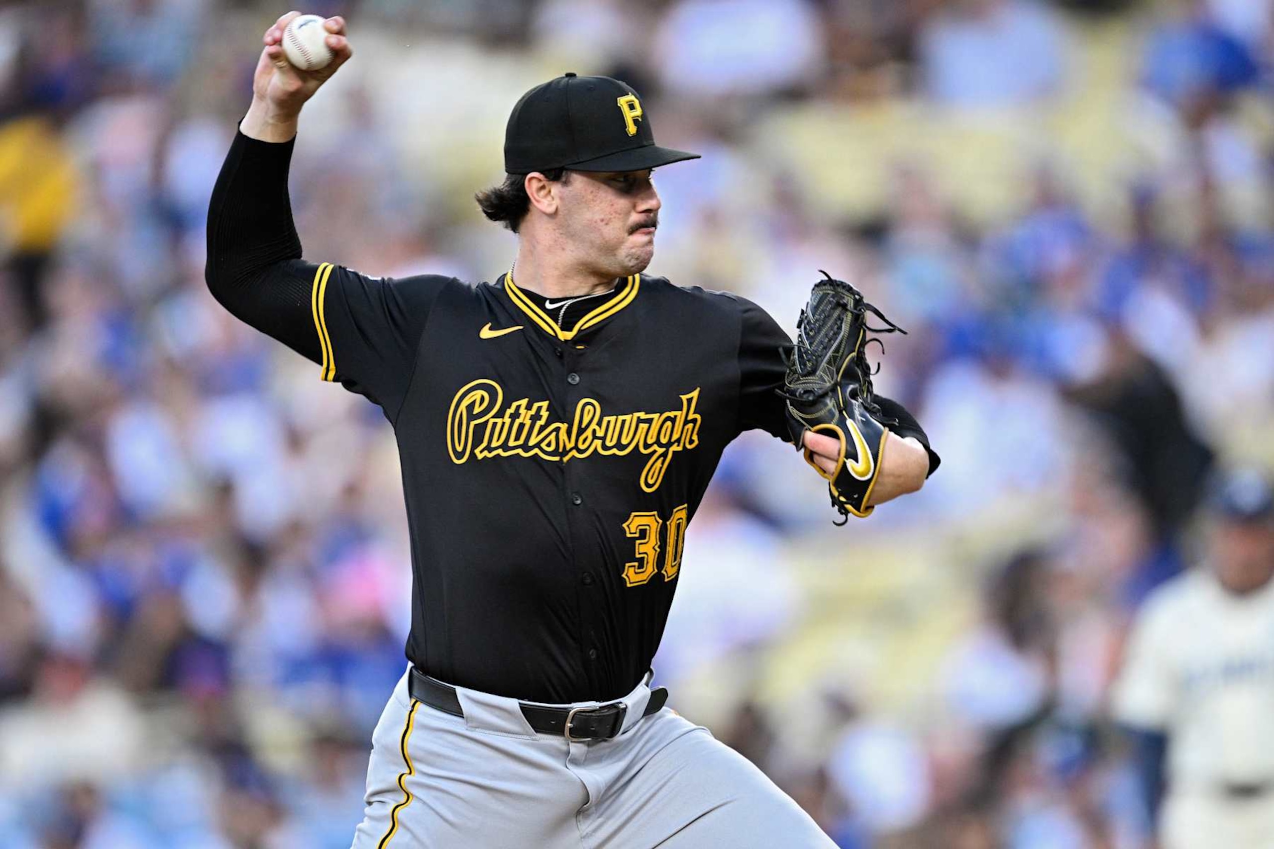 LOS ANGELES, CALIFORNIA - AUGUST 10: Paul Skenes #30 of the Pittsburgh Pirates pitches against the Los Angeles Dodgers during the third inning at Dodger Stadium on August 10, 2024 in Los Angeles, California. (Photo by Orlando Ramirez/Getty Images)