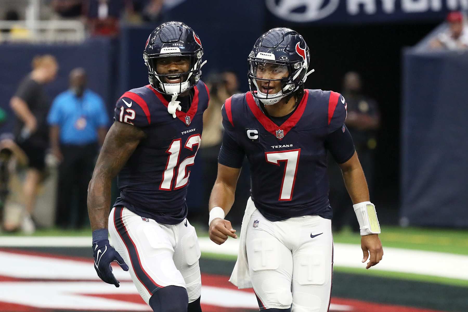 Texans WR Nico Collins (left) and QB C.J. Stroud (right)