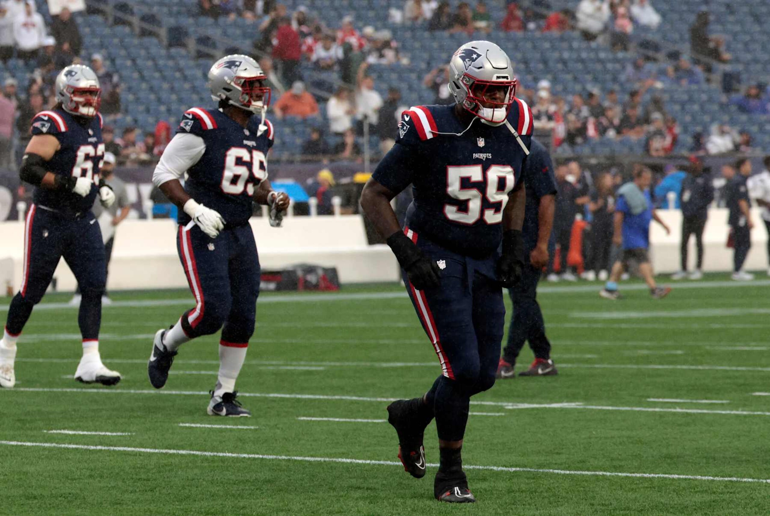 FOXBOROUGH, MA - AUGUST 08: New England Patriots offensive tackle Vederian Lowe (59) in warm up before a preseason game between the New England Patriots and the Carolina Panthers on August 8, 2024, at Gillette Stadium in Foxborough, Massachusetts. (Photo by Fred Kfoury III/Icon Sportswire via Getty Images)