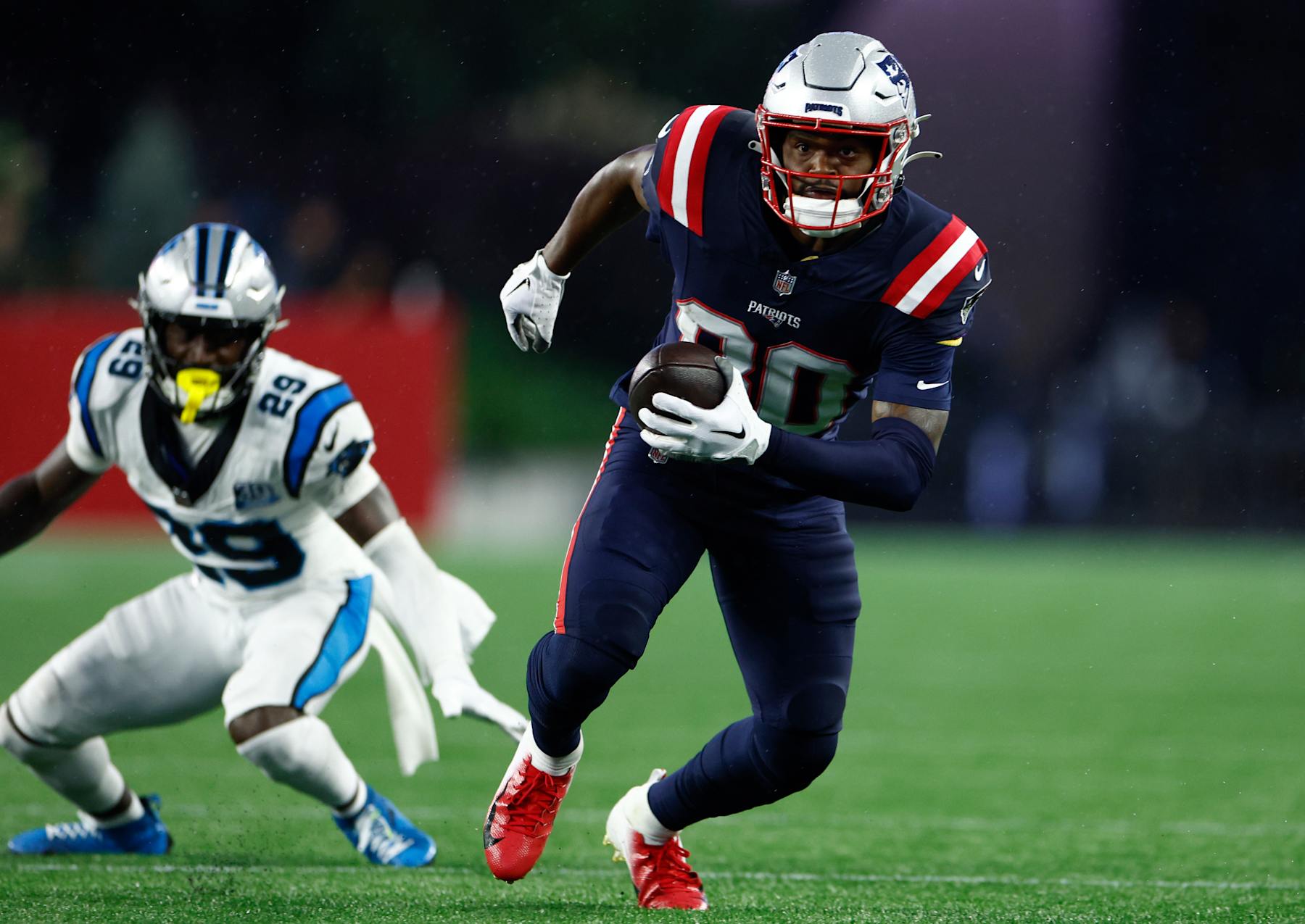 Foxborough, MA - August 8: New England Patriots WR Kayshon Boutte makes a catch over Carolina Panthers CB D'Shawn Jamison in the first half of a preseason game at Gillette Stadium. (Photo by Danielle Parhizkaran/The Boston Globe via Getty Images) Foxborough, MA - August 8: New England Patriots WR Kayshon Boutte makes a catch over Carolina Panthers CB D'Shawn Jamison in the first half of a preseason game at Gillette Stadium. (Photo by Danielle Parhizkaran/The Boston Globe via Getty Images)