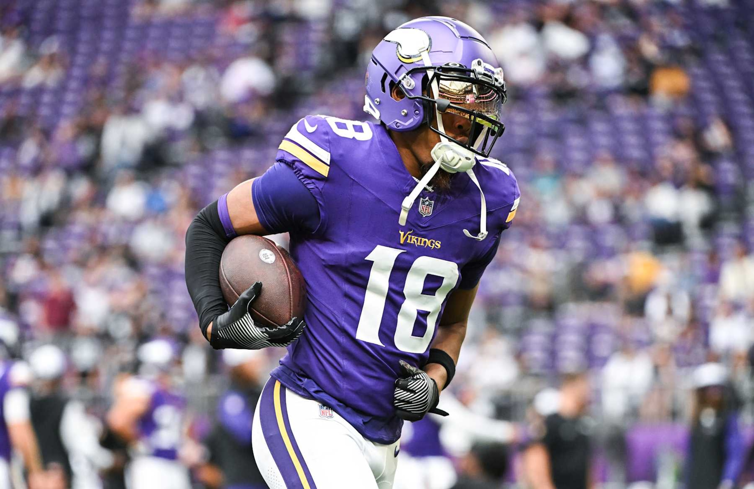 MINNEAPOLIS, MINNESOTA - AUGUST 10: Justin Jefferson #18 of the Minnesota Vikings warms up before the preseason game against the Las Vegas Raiders at U.S. Bank Stadium on August 10, 2024 in Minneapolis, Minnesota. (Photo by Stephen Maturen/Getty Images)