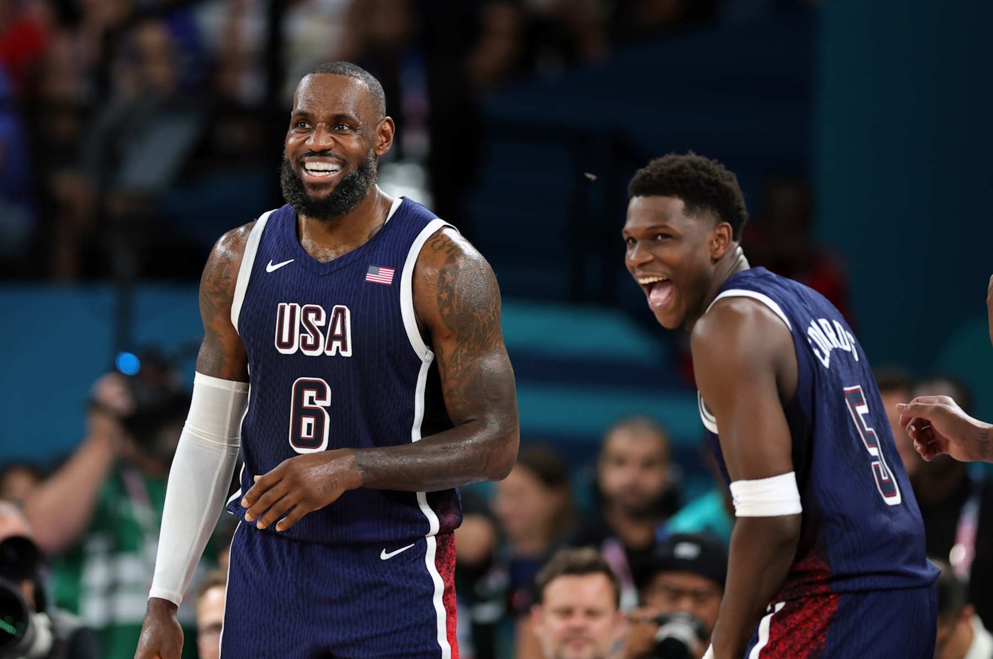 Paris, FRANCE - AUGUST 06: LeBron James of United States and Anthony Edwards of United States having fun during the Men's basketball quarterfinal game between Team United States and Team Brazil on day eleven of the Olympic Games Paris 2024 at Bercy Arena on August 06, 2024 in Paris, France. (Photo by Christina Pahnke - sampics/Getty Images)
