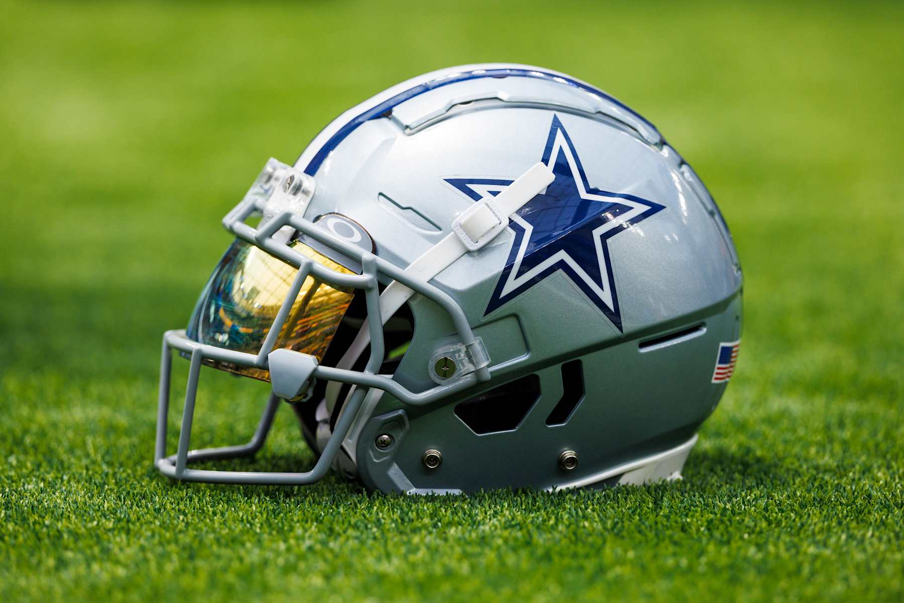 INGLEWOOD, CALIFORNIA - AUGUST 11: A detail view of a Dallas Cowboys helmet on the field during a preseason game against the Los Angeles Rams at SoFi Stadium on August 11, 2024 in Inglewood, California. (Photo by Ric Tapia/Getty Images)