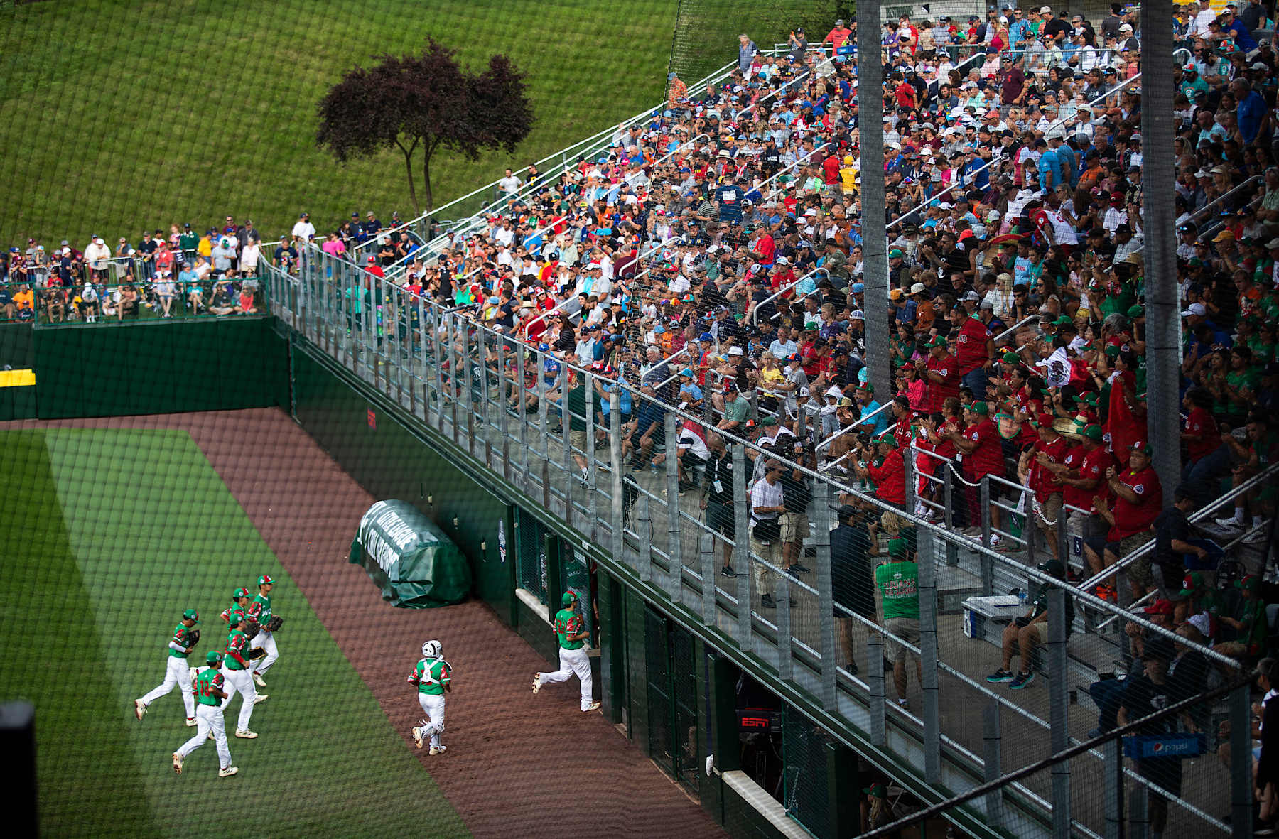 SOUTH WILLIAMSPORT, PA - AUGUST 19: Mexico players jog off the field after ending the second inning in their game against Japan on Friday, August 18, 2023, at Volunteer Stadium. (Staff photo by Derek Davis/Portland Press Herald via Getty Images)