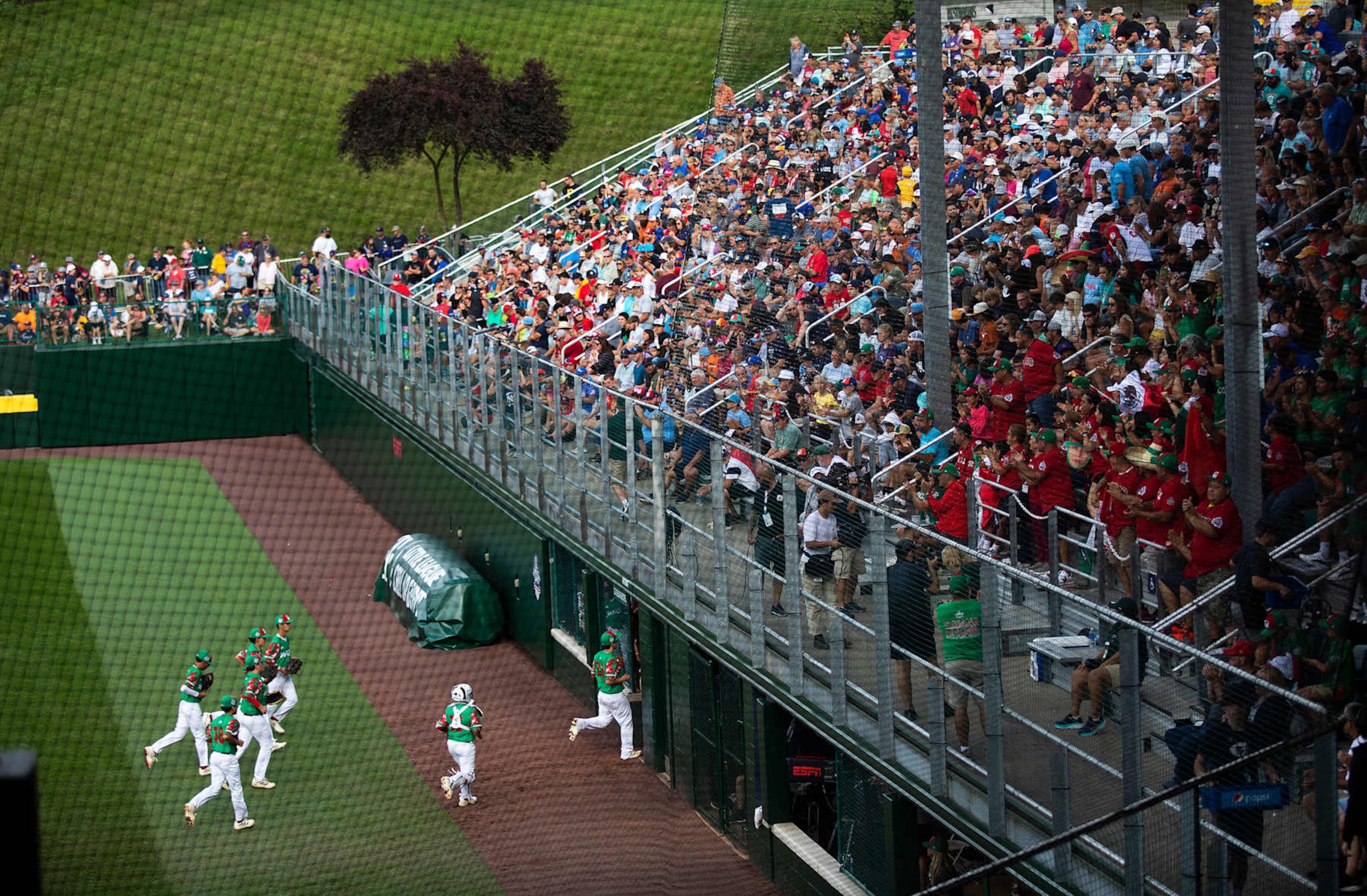 SOUTH WILLIAMSPORT, PA - AUGUST 19: Mexico players jog off the field after ending the second inning in their game against Japan on Friday, August 18, 2023, at Volunteer Stadium. (Staff photo by Derek Davis/Portland Press Herald via Getty Images)