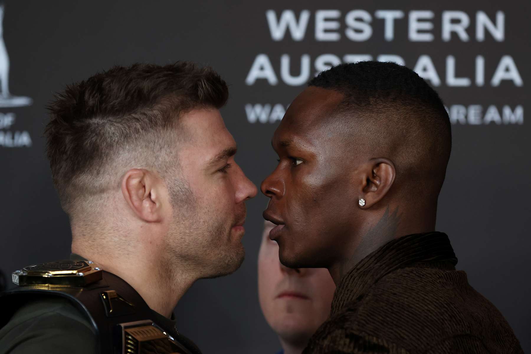 Dricus Du Plessis (left) and Israel Adesanya face-off before their UFC 305 middleweight title fight