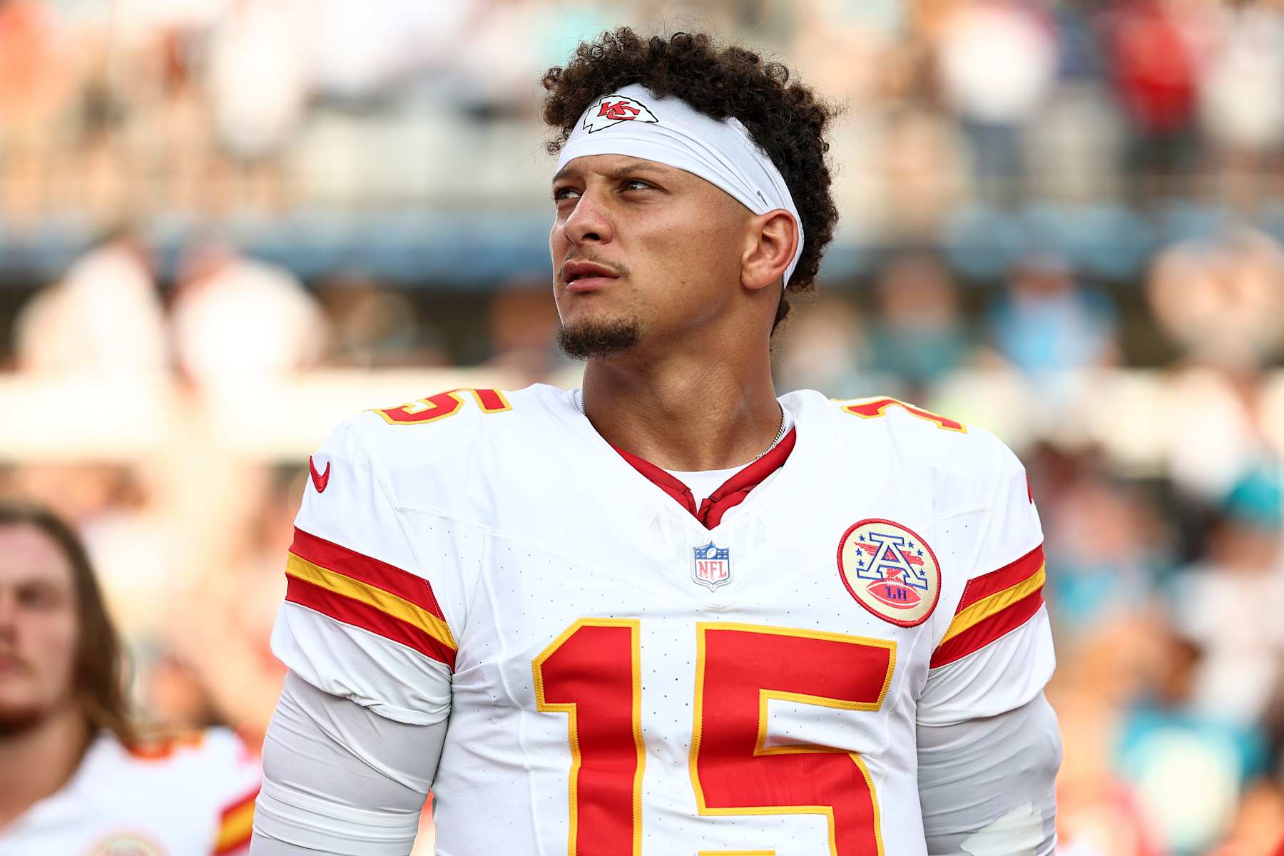 JACKSONVILLE, FL - AUGUST 10: Patrick Mahomes #15 of the Kansas City Chiefs stands on the sidelines during the national anthem prior to an NFL preseason football game against the Jacksonville Jaguars at EverBank Stadium on August 10, 2024 in Jacksonville, Florida. (Photo by Kevin Sabitus/Getty Images)