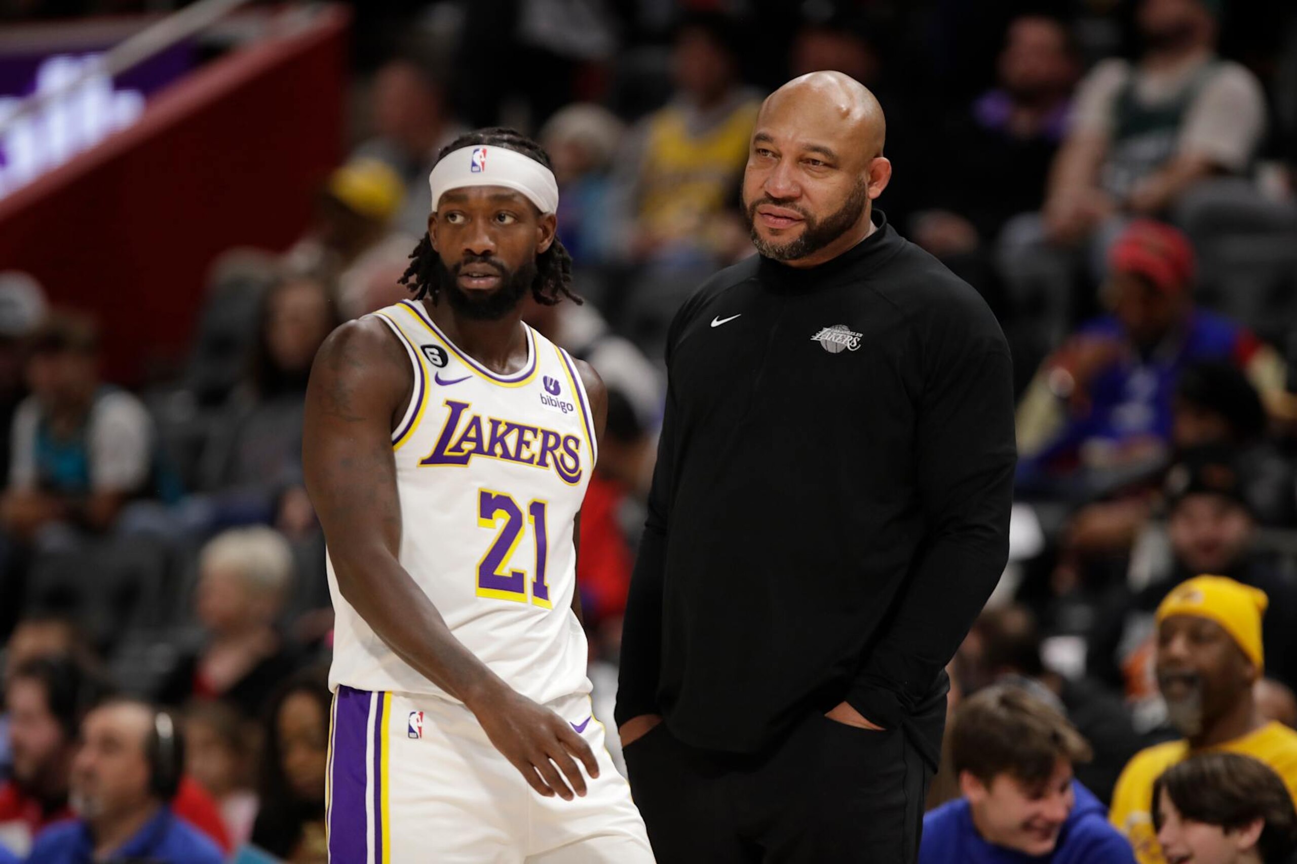 DETROIT, MI - DECEMBER 11: Darvin Ham and Patrick Beverley #21 of the Los Angeles Lakers look on against the Detroit Pistons on December 11, 2022 at Little Caesars Arena in Detroit, Michigan. NOTE TO USER: User expressly acknowledges and agrees that, by downloading and/or using this photograph, User is consenting to the terms and conditions of the Getty Images License Agreement. Mandatory Copyright Notice: Copyright 2022 NBAE (Photo by Brian Sevald/NBAE via Getty Images)