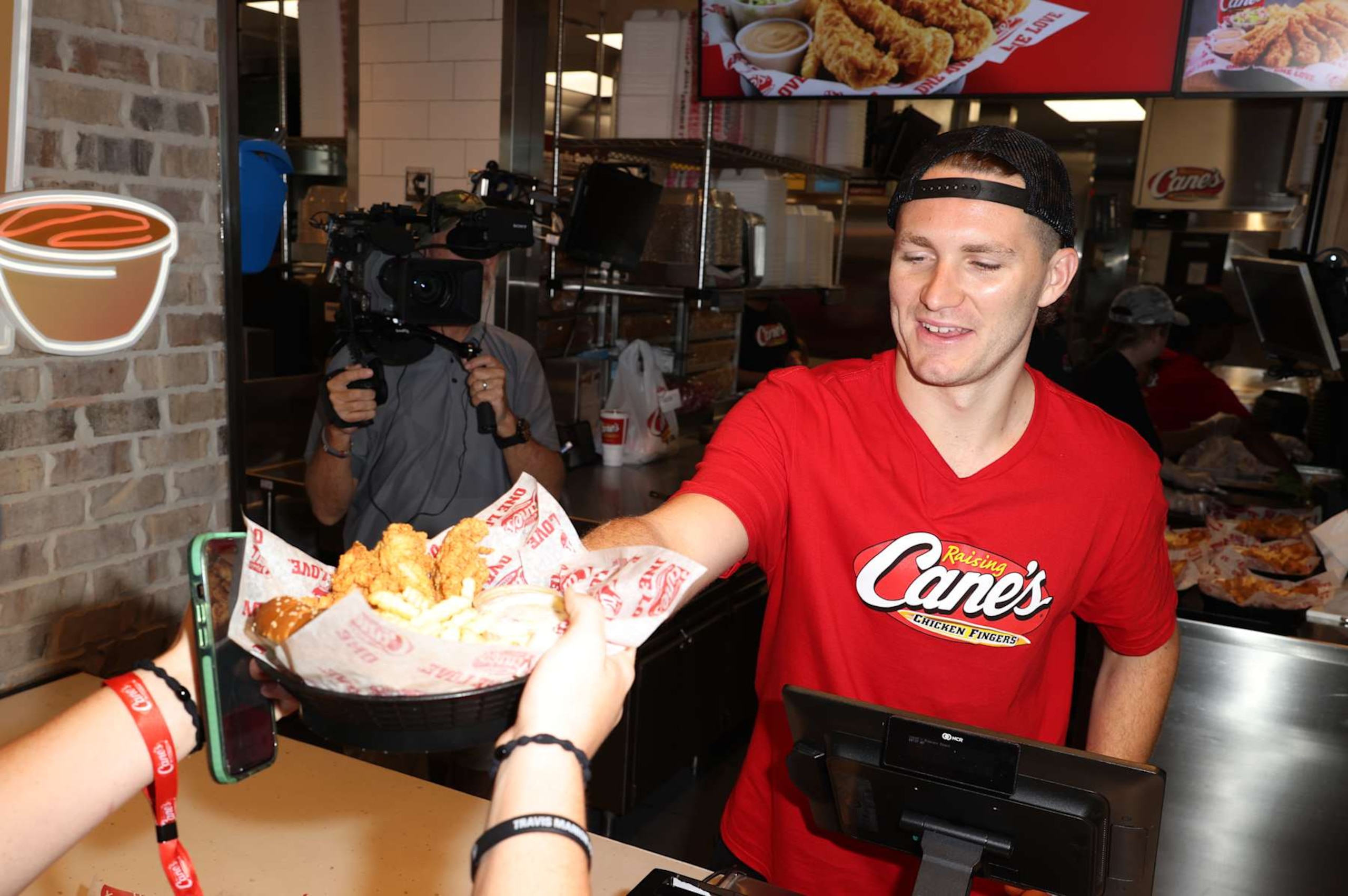 Stanley Cup champion and Raising Cane's employee, Matthew Tkachuk.
