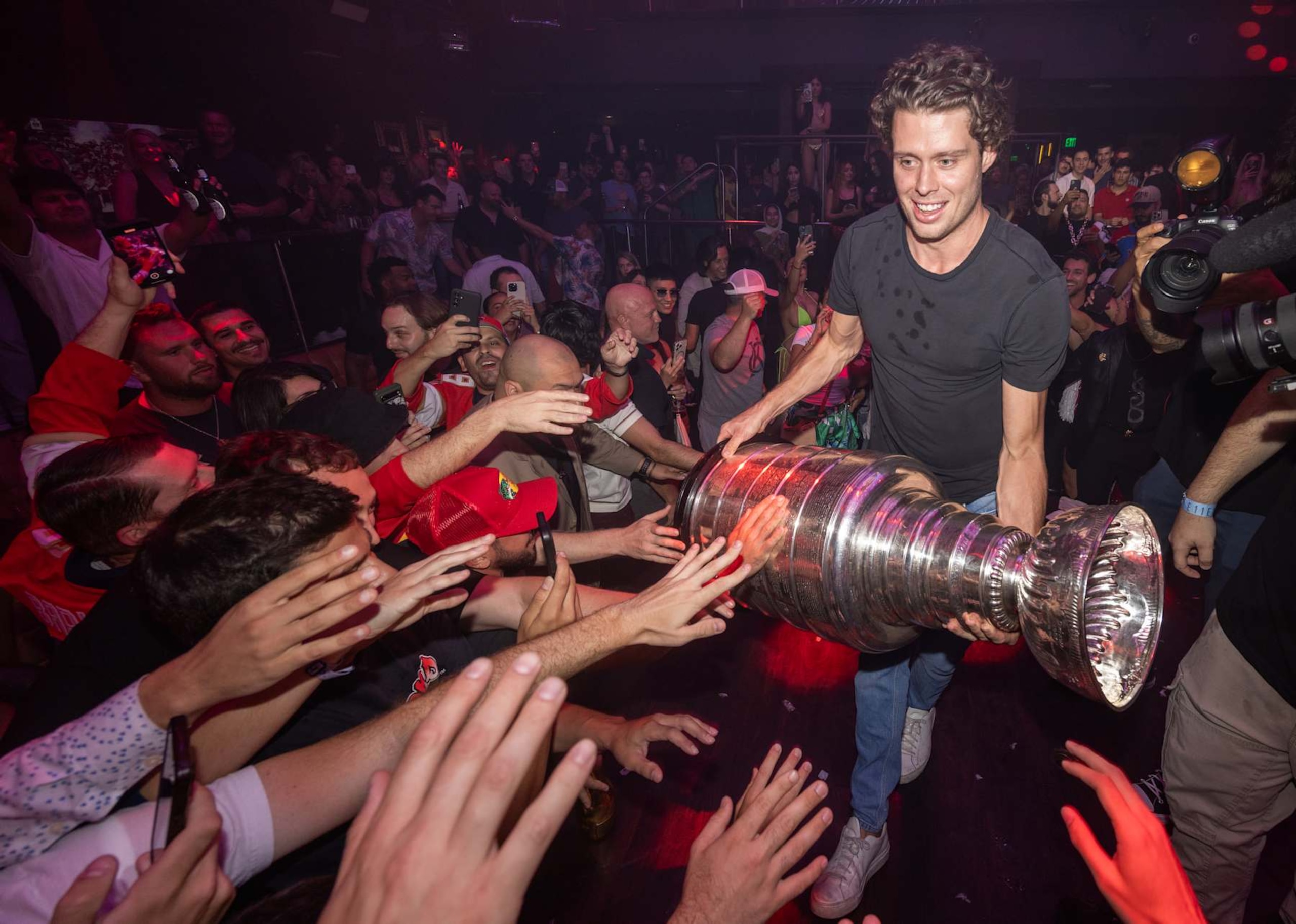 Carter Verhaeghe and the Stanley Cup in the club.