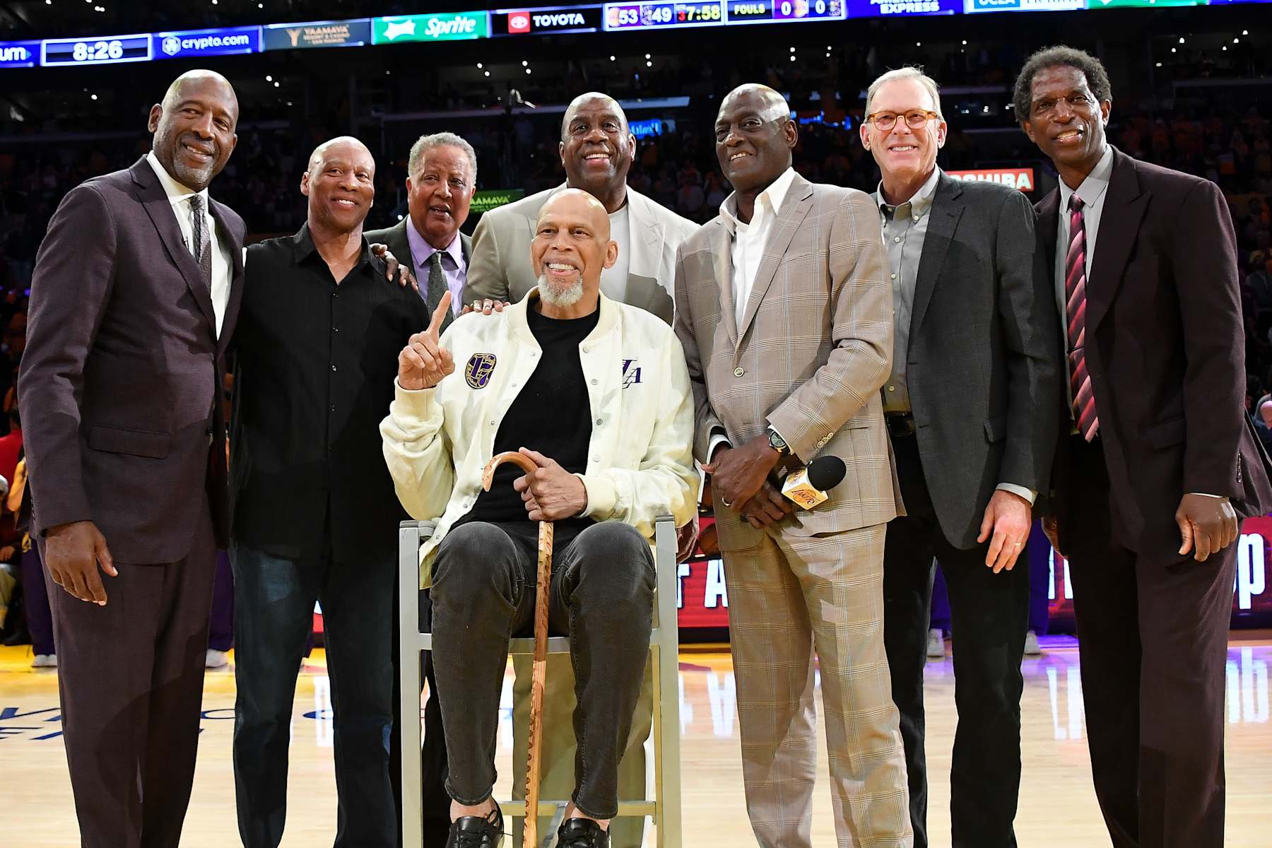 LOS ANGELES, CALIFORNIA - APRIL 25: (L-R) James Worthy, Byron Scott, Jamaal Wilkes, Magic Johnson, Kareem Abdul-Jabbar, Michael Cooper Jr., Kurt Rambis and A. C. Green attend a ceremony celebrating Michael Cooper's induction into the basketball hall of fame at halftime of a basketball game between the Los Angeles Lakers and the Denver Nuggets at Crypto.com Arena on April 25, 2024 in Los Angeles, California. NOTE TO USER: User expressly acknowledges and agrees that, by downloading and or using this photograph, User is consenting to the terms and conditions of the Getty Images License Agreement.  (Photo by Allen Berezovsky/Getty Images)