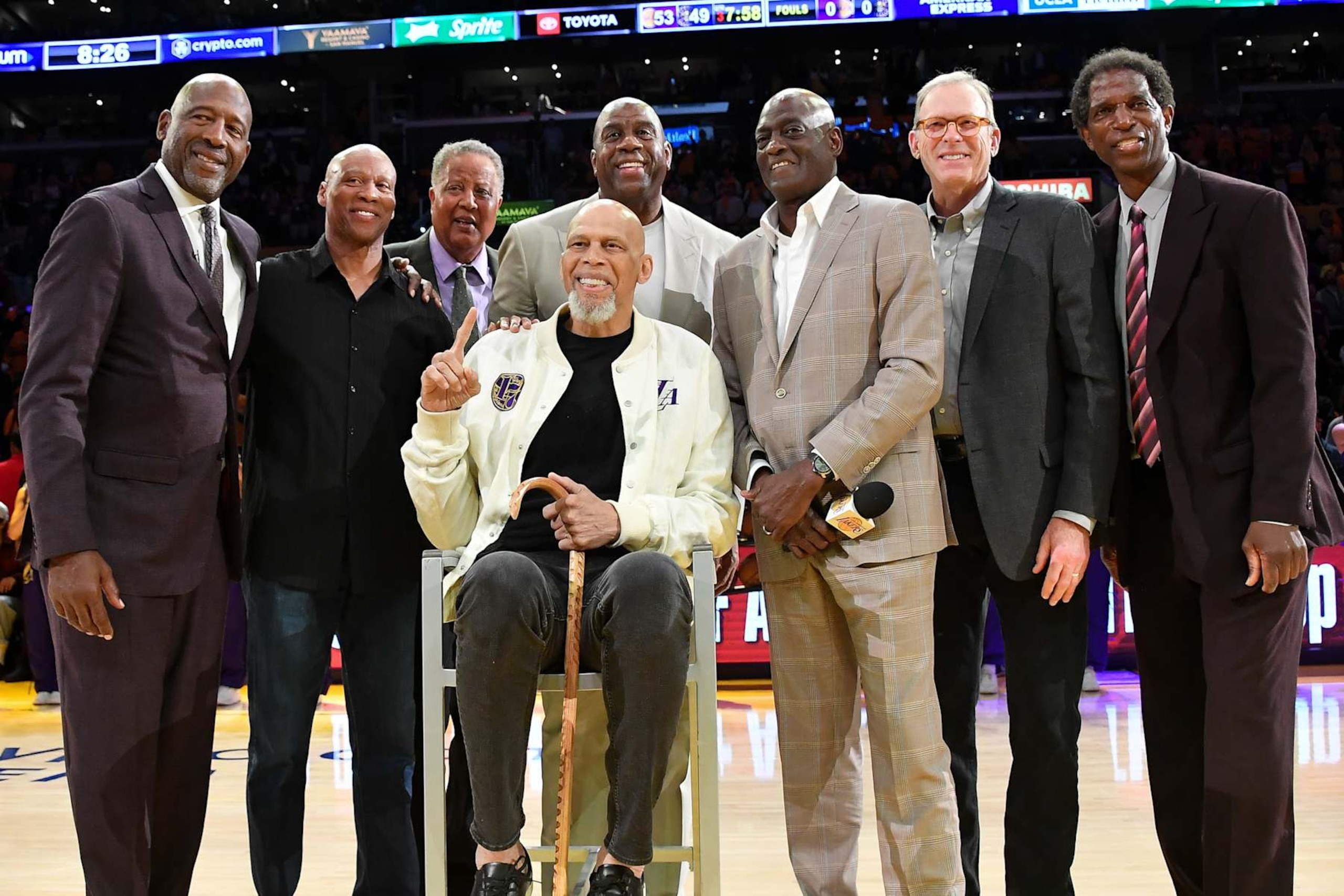 LOS ANGELES, CALIFORNIA - APRIL 25: (L-R) James Worthy, Byron Scott, Jamaal Wilkes, Magic Johnson, Kareem Abdul-Jabbar, Michael Cooper Jr., Kurt Rambis and A. C. Green attend a ceremony celebrating Michael Cooper's induction into the basketball hall of fame at halftime of a basketball game between the Los Angeles Lakers and the Denver Nuggets at Crypto.com Arena on April 25, 2024 in Los Angeles, California. NOTE TO USER: User expressly acknowledges and agrees that, by downloading and or using this photograph, User is consenting to the terms and conditions of the Getty Images License Agreement.  (Photo by Allen Berezovsky/Getty Images)