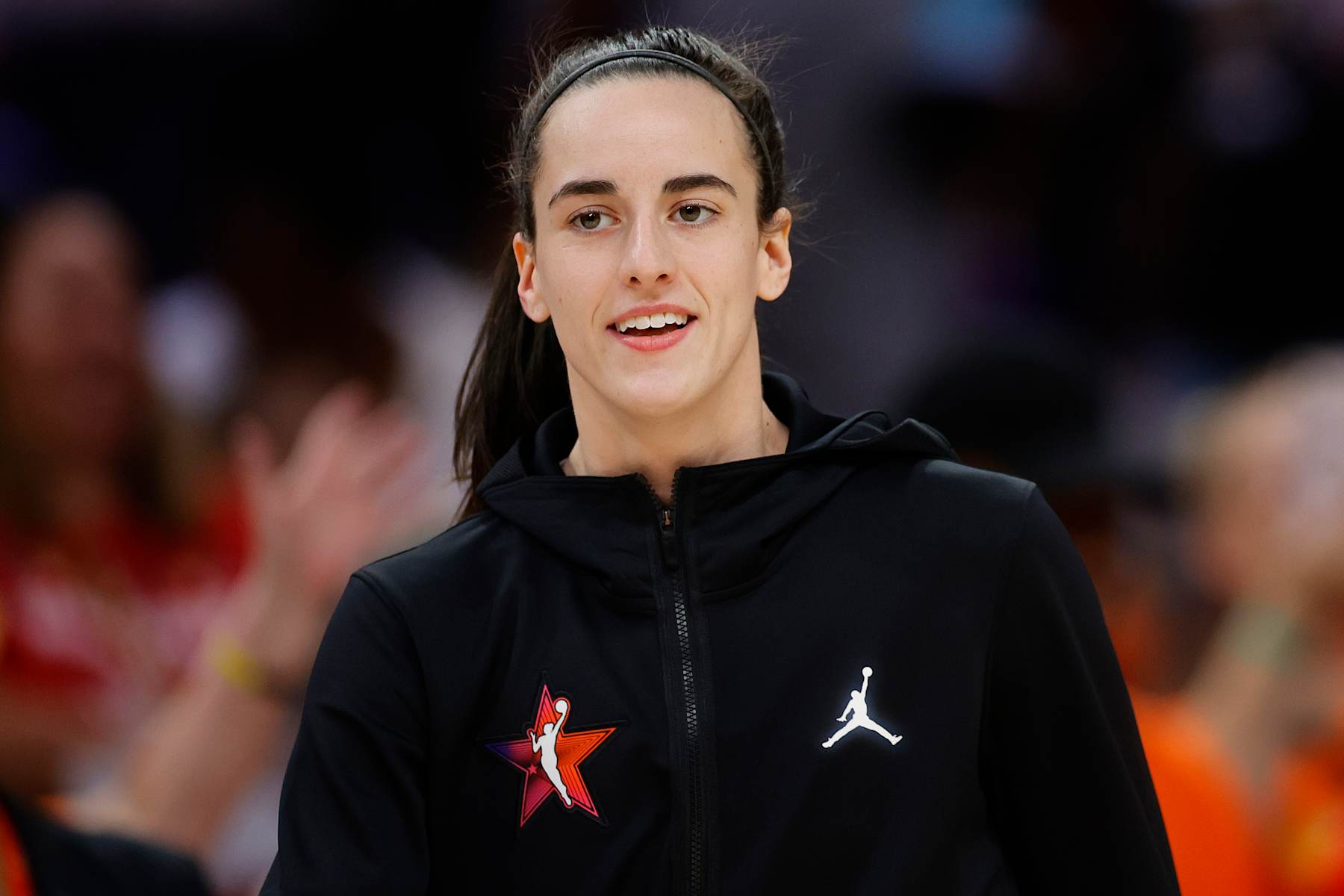 PHOENIX, ARIZONA - JULY 20: Caitlin Clark #22 of Team WNBA looks on prior to the game against Team USA in the 2024 WNBA All Star Game at Footprint Center on July 20, 2024 in Phoenix, Arizona.  (Photo by Alex Slitz/Getty Images)