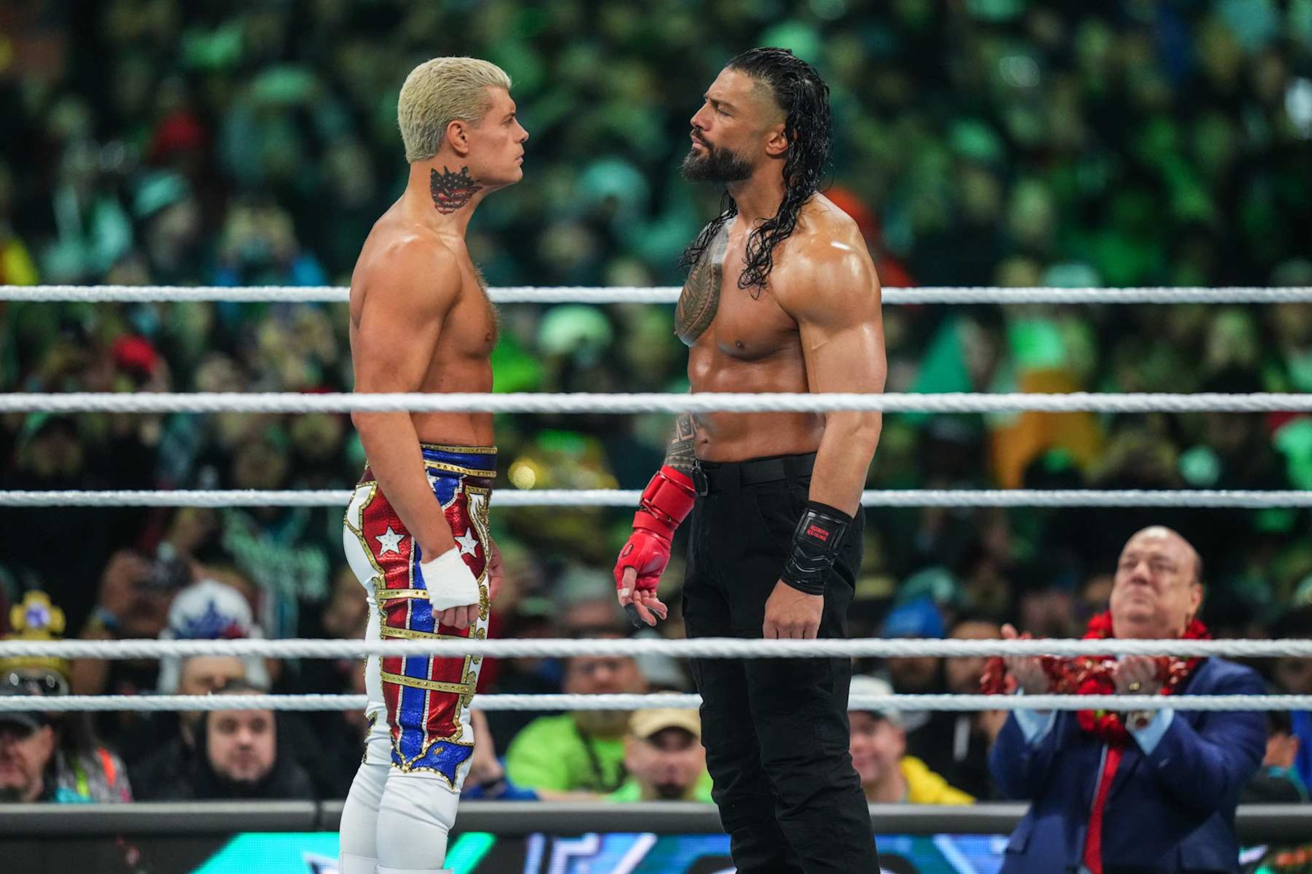 PHILADELPHIA, PENNSYLVANIA - APRIL 7: Cody Rhodes faces off with Roman Reigns during Night Two of WrestleMania 40 at Lincoln Financial Field on April 7, 2024 in Philadelphia, Pennsylvania. (Photo by WWE/Getty Images) PHILADELPHIA, PENNSYLVANIA - APRIL 7: Cody Rhodes faces off with Roman Reigns during Night Two of WrestleMania 40 at Lincoln Financial Field on April 7, 2024 in Philadelphia, Pennsylvania. (Photo by WWE/Getty Images)