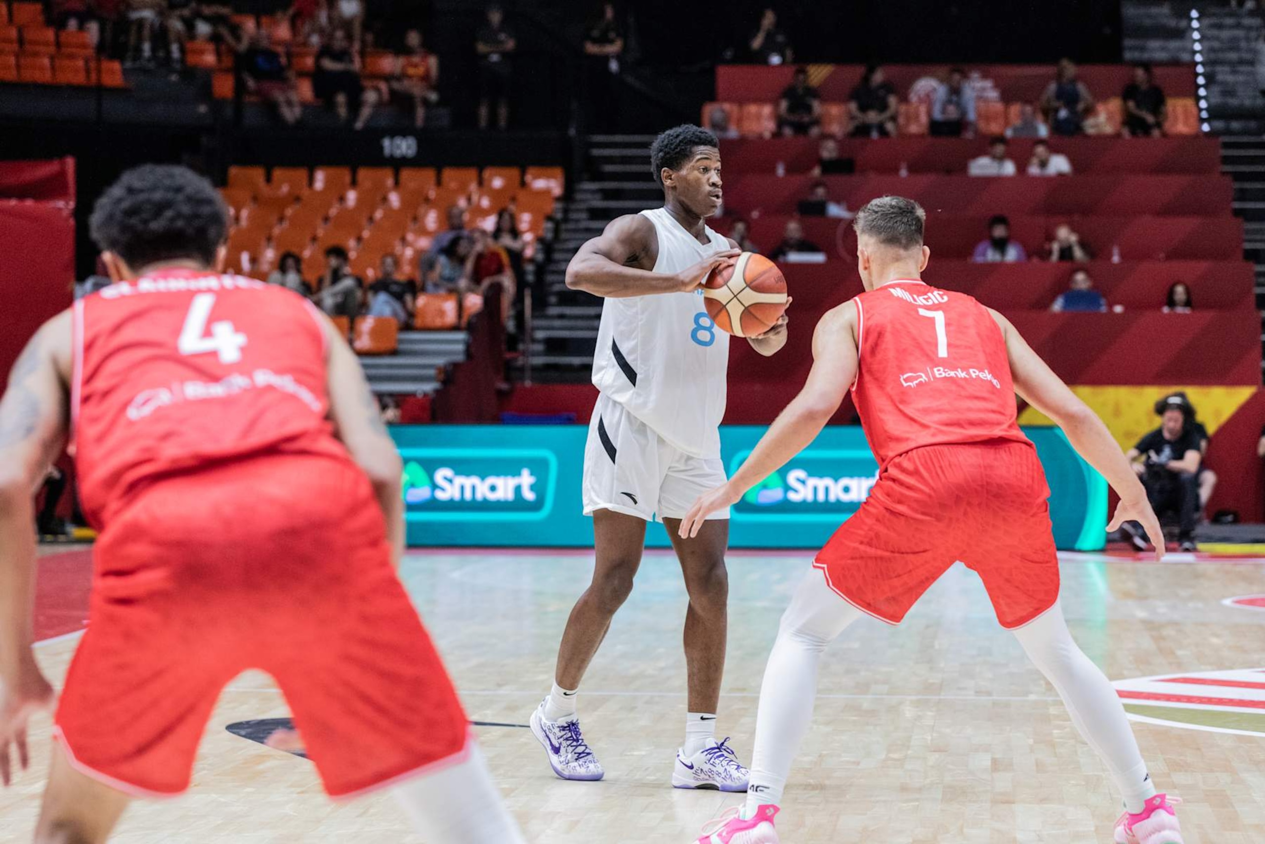 VALENCIA, SPAIN - 2024/07/03: V.J. Edgecombe (L) of Bahamas and Igor Milicic (R) of Poland in action during the Olympic Qualifying Tournament match between Bahamas and Poland at Pabellon Fuente de San Luis. Final score: Bahamas 90-81 Poland. (Photo by Nicholas Muller/SOPA Images/LightRocket via Getty Images)