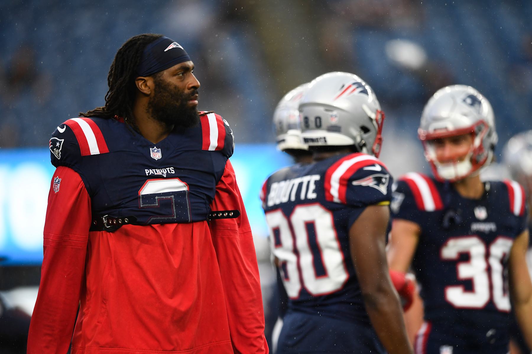 FOXBOROUGH, MASSACHUSETTS - AUGUST 08: Matthew Judon #9 of the New England Patriots looks on before a preseason game against the Carolina Panthers at Gillette Stadium on August 08, 2024 in Foxborough, Massachusetts. (Photo by Jaiden Tripi/Getty Images)