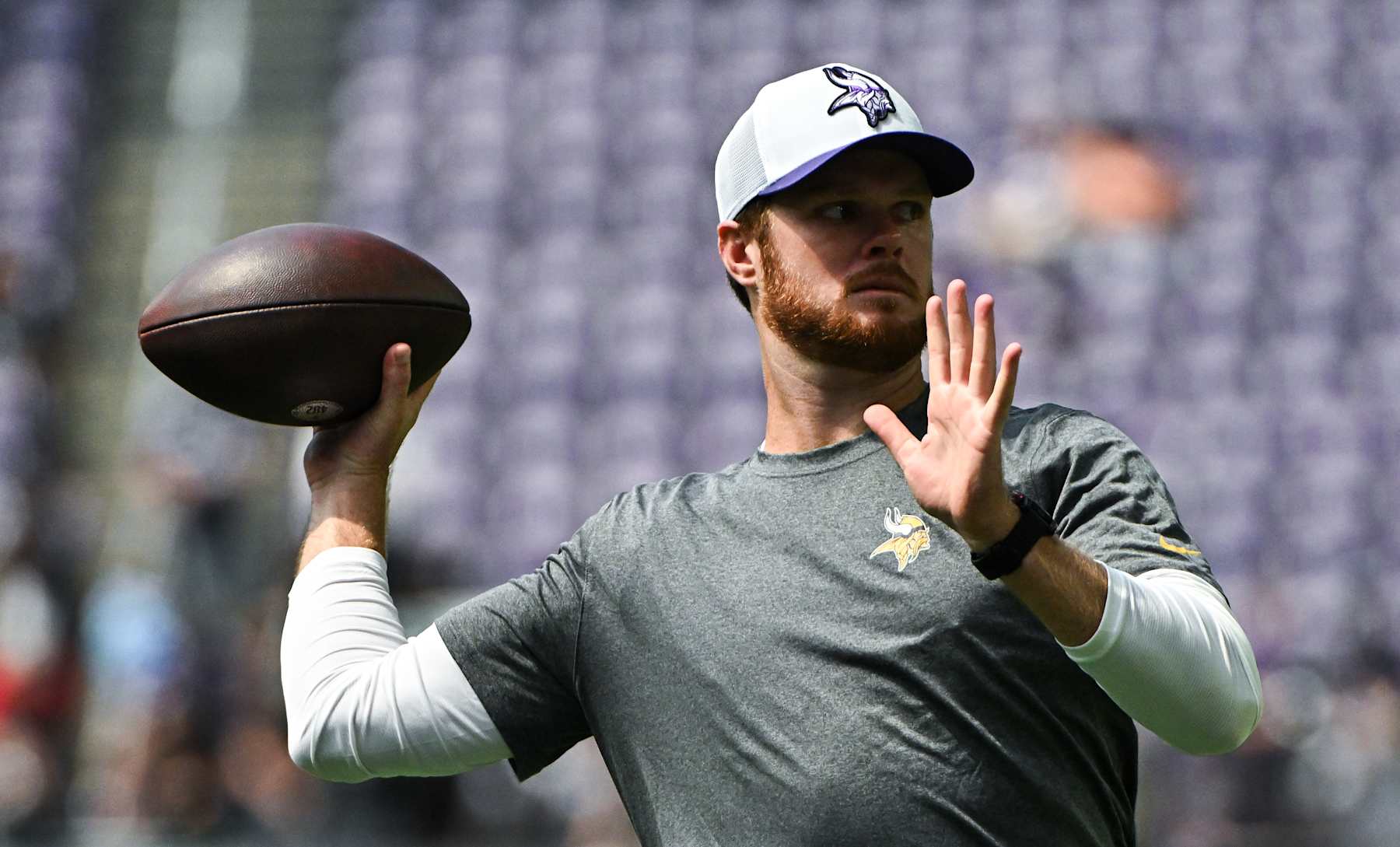 MINNEAPOLIS, MINNESOTA - AUGUST 10: Sam Darnold #14 of the Minnesota Vikings warms up before the game against the Las Vegas Raiders at U.S. Bank Stadium on August 10, 2024 in Minneapolis, Minnesota. (Photo by Stephen Maturen/Getty Images)