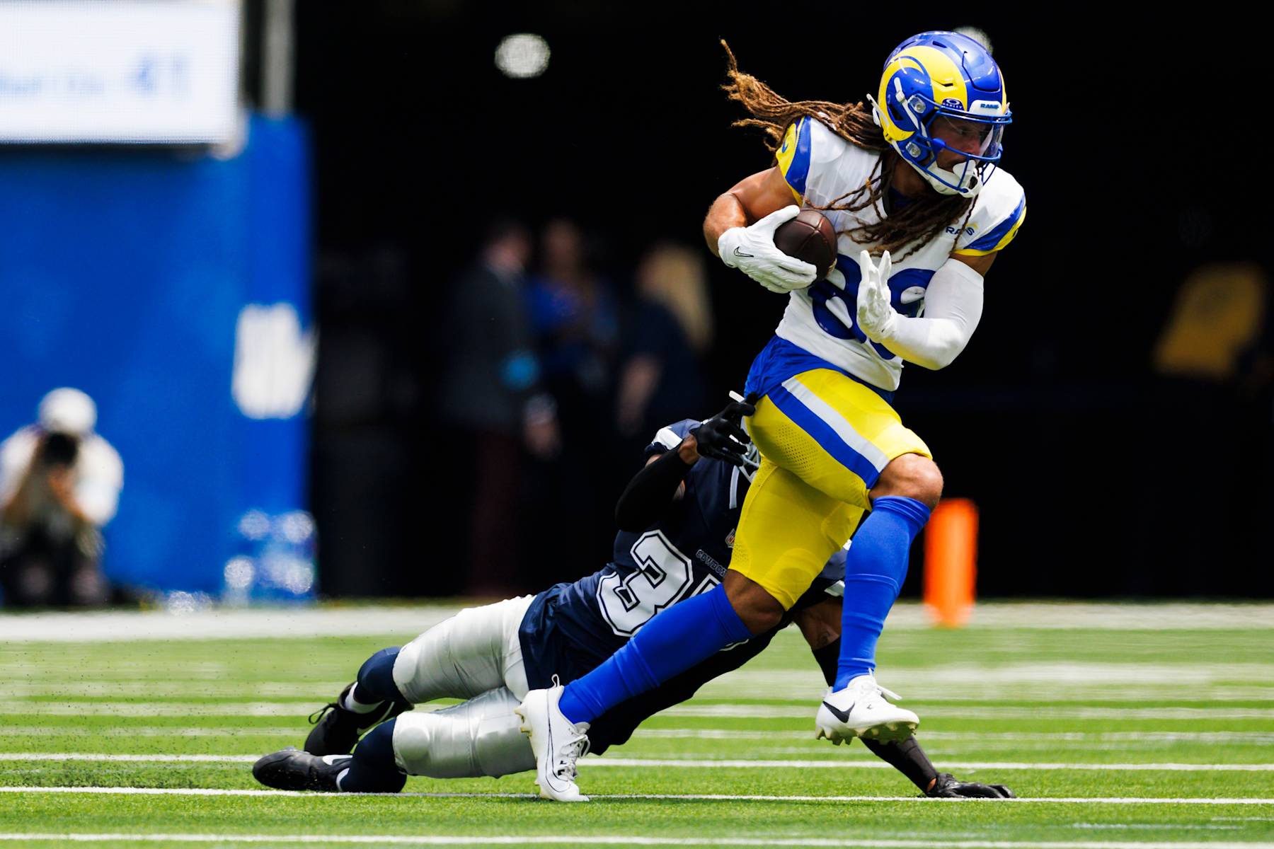 INGLEWOOD, CALIFORNIA - AUGUST 11: Jordan Whittington #88 of the Los Angeles Rams runs after the catch during a preseason game against the Dallas Cowboys at SoFi Stadium on August 11, 2024 in Inglewood, California. (Photo by Ric Tapia/Getty Images)
