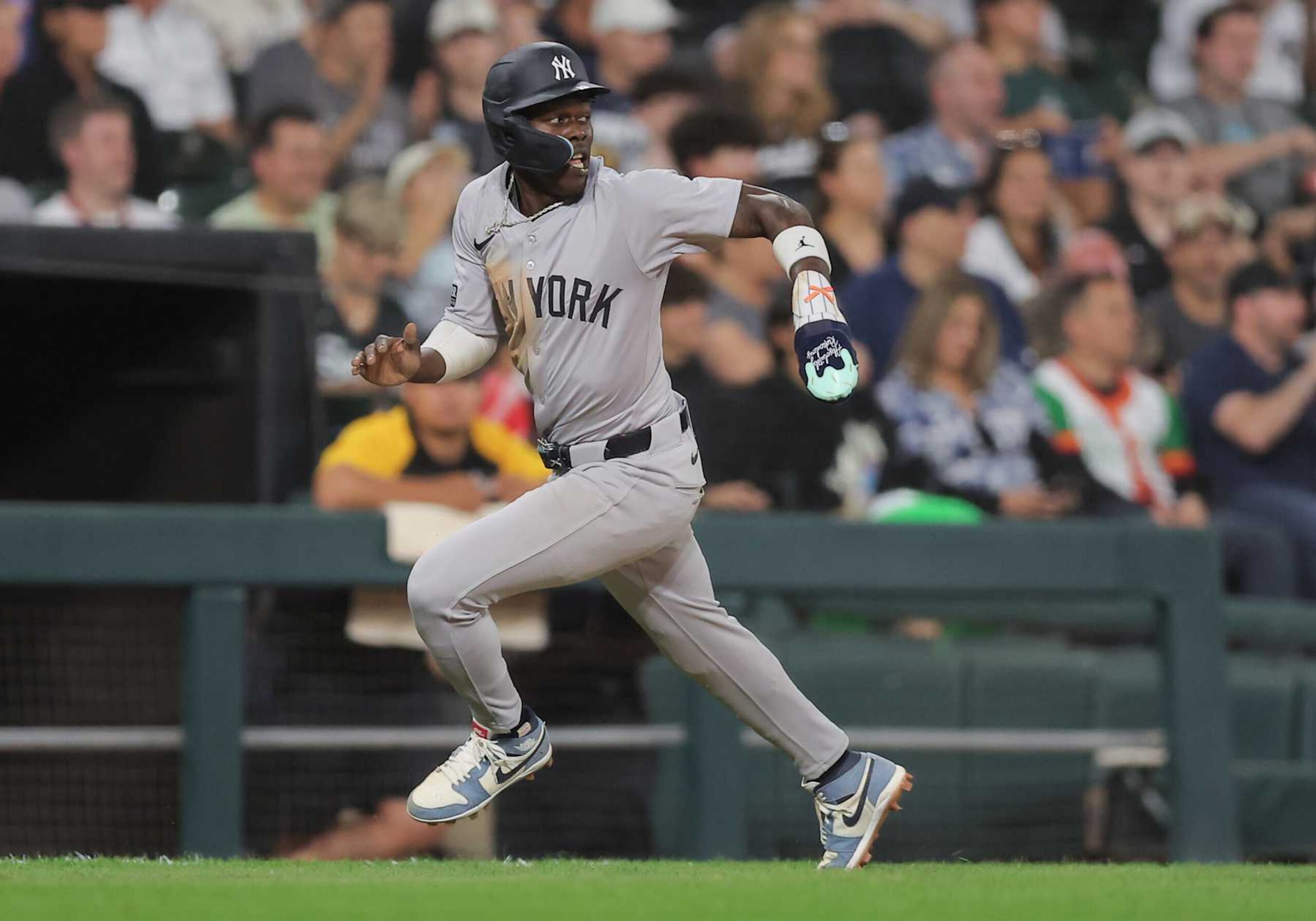 CHICAGO, IL - AUGUST 12: Jazz Chisholm Jr. #13 of the New York Yankees runs towards home plate during the fifth inning of a baseball game against the Chicago White Sox on August 12, 2024 at Guaranteed Rate Field in Chicago,Illinois. (Photo by Melissa Tamez/Icon Sportswire via Getty Images)