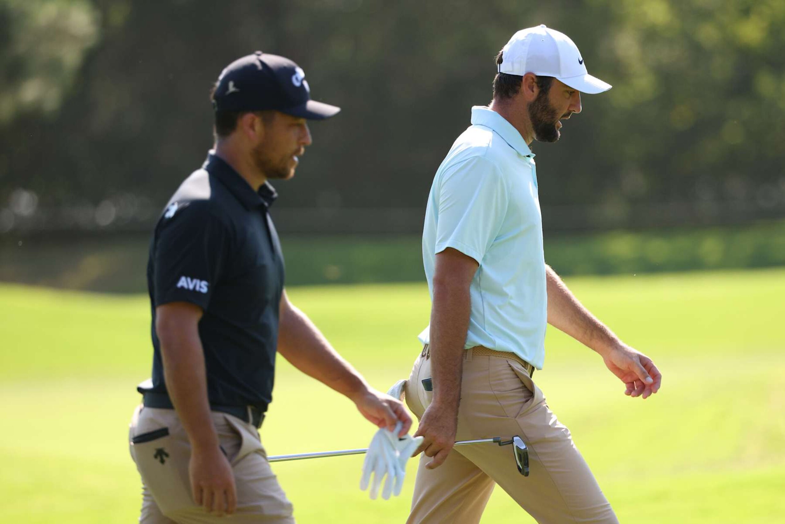 MEMPHIS, TENNESSEE - AUGUST 16: Xander Schauffele of the United States and Scottie Scheffler of the United States walks the first fairway during the second round of the FedEx St. Jude Championship at TPC Southwind on August 16, 2024 in Memphis, Tennessee. (Photo by Mike Mulholland/Getty Images) MEMPHIS, TENNESSEE - AUGUST 16: Xander Schauffele of the United States and Scottie Scheffler of the United States walks the first fairway during the second round of the FedEx St. Jude Championship at TPC Southwind on August 16, 2024 in Memphis, Tennessee. (Photo by Mike Mulholland/Getty Images)