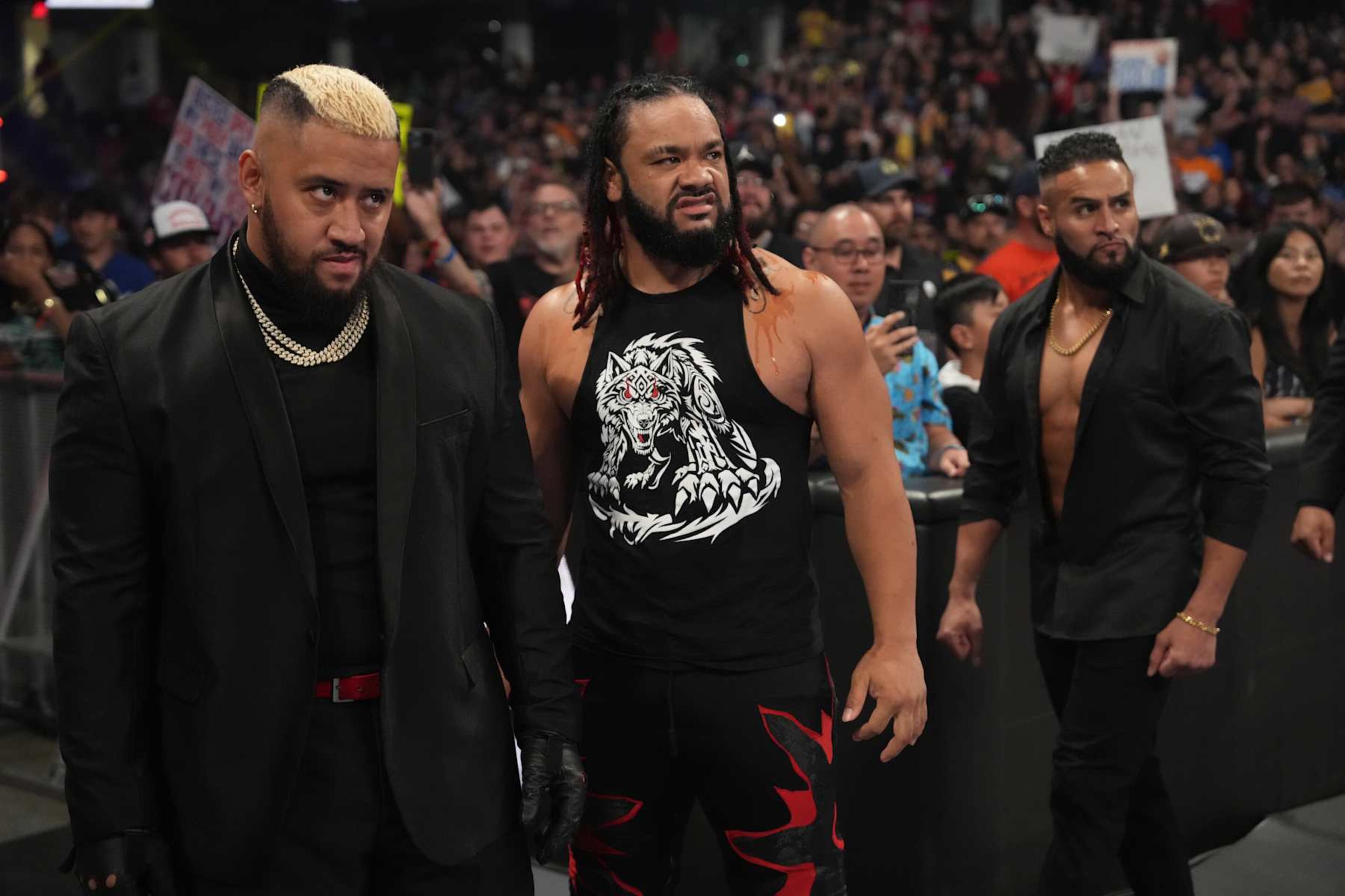 CLEVELAND, OHIO - AUGUST 2: Solo Sikoa, Jacob Fatu and Tama Tonga during SmackDown at Rocket Mortgage FieldHouse on August 2, 2024 in Cleveland, Ohio.  (Photo by WWE/Getty Images)