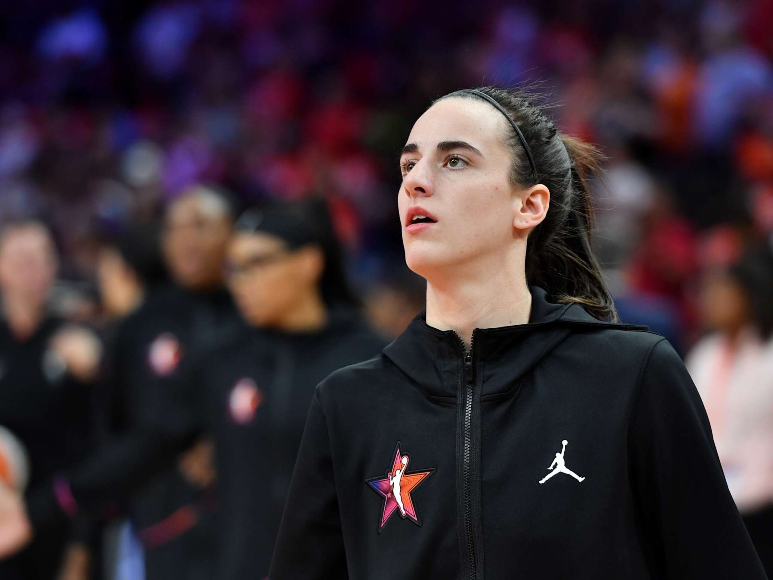 PHOENIX, AZ - JULY 20: Caitlin Clark #22 of Team WNBA looks on before the game against the USA Basketball Women's National Team during the 2024 WNBA All Star Game on July 20, 2024 at Footprint Center in Phoenix, Arizona. NOTE TO USER: User expressly acknowledges and agrees that, by downloading and or using this photograph, user is consenting to the terms and conditions of the Getty Images License Agreement. Mandatory Copyright Notice: Copyright 2024 NBAE (Photo by Juan Ocampo/NBAE via Getty Images)