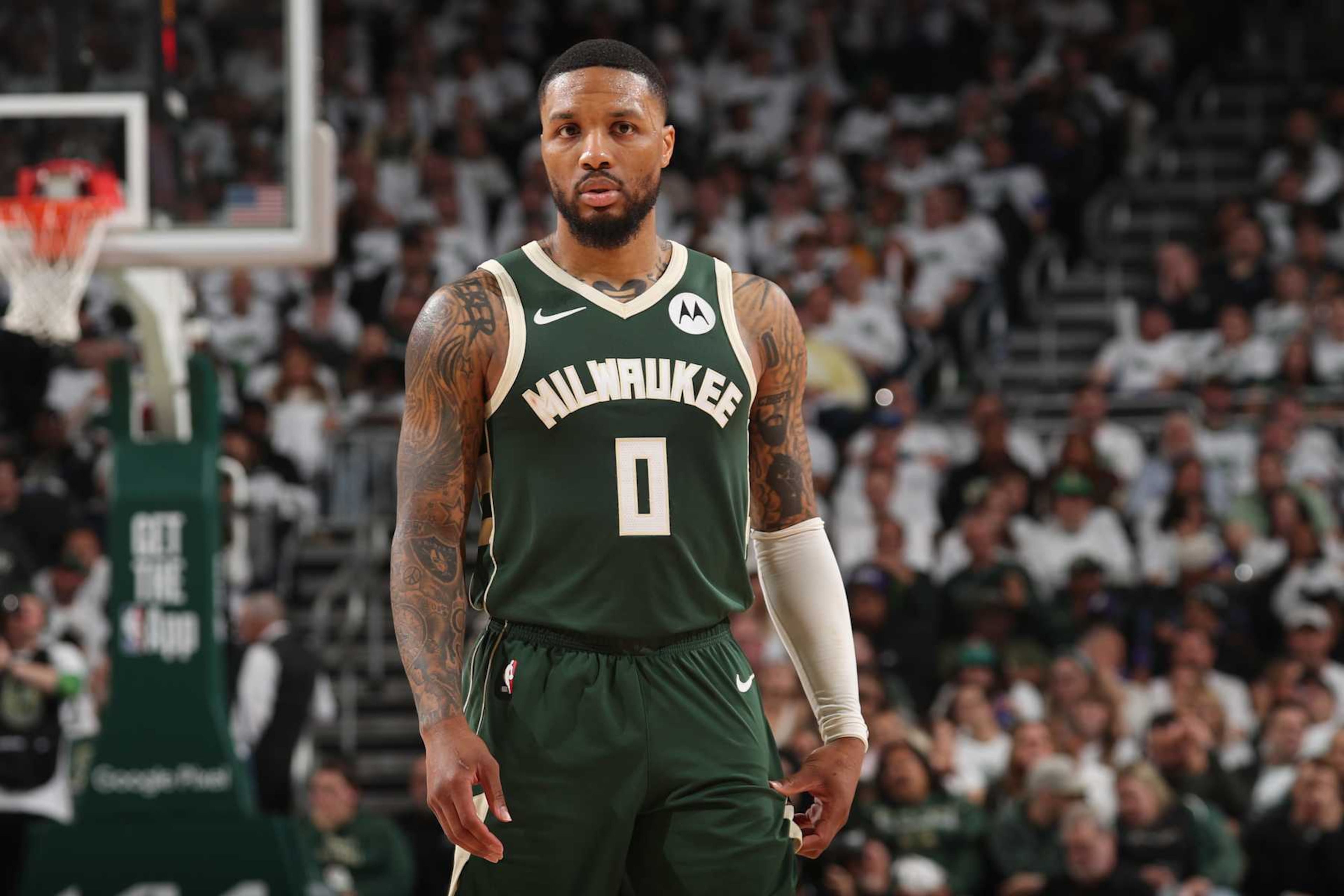 MILWAUKEE, WI - APRIL 23: Damian Lillard #0 of the Milwaukee Bucks looks on during the game against the Indiana Pacers during Round One Game Two of the 2024 NBA Playoffs on April 23, 2024 at the Fiserv Forum Center in Milwaukee, Wisconsin. NOTE TO USER: User expressly acknowledges and agrees that, by downloading and or using this Photograph, user is consenting to the terms and conditions of the Getty Images License Agreement. Mandatory Copyright Notice: Copyright 2024 NBAE (Photo by Gary Dineen/NBAE via Getty Images). MILWAUKEE, WI - APRIL 23: Damian Lillard #0 of the Milwaukee Bucks looks on during the game against the Indiana Pacers during Round One Game Two of the 2024 NBA Playoffs on April 23, 2024 at the Fiserv Forum Center in Milwaukee, Wisconsin. NOTE TO USER: User expressly acknowledges and agrees that, by downloading and or using this Photograph, user is consenting to the terms and conditions of the Getty Images License Agreement. Mandatory Copyright Notice: Copyright 2024 NBAE (Photo by Gary Dineen/NBAE via Getty Images).