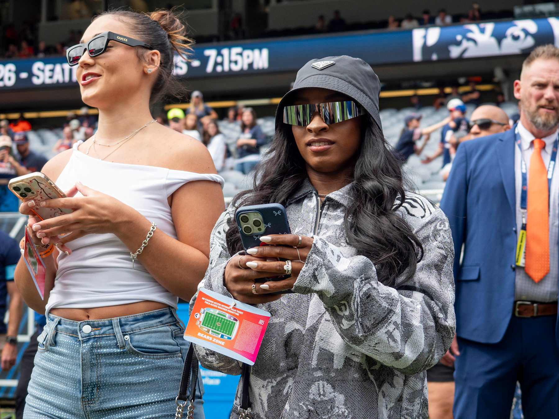 CHICAGO, IL - AUGUST 17: Team USA Olympic Gymnastics Gold Medalist Simone Biles watches the Chicago Bears warm up before a preseason game between the Cincinnati Bengals and the Chicago Bears on August 17, 2024, at Soldier Field in Chicago, Illinois.  (Photo by Joseph Weiser/Icon Sportswire via Getty Images)