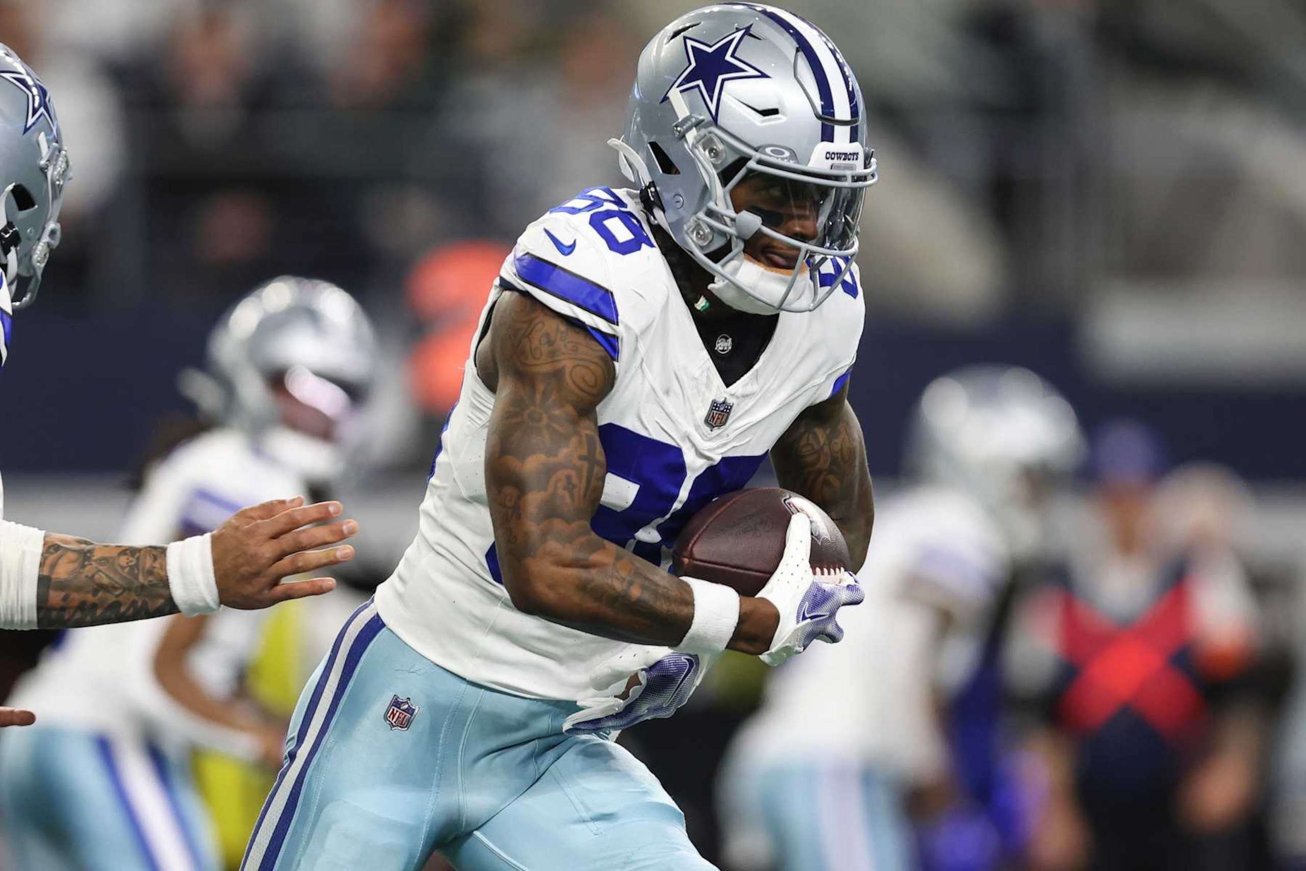 ARLINGTON, TX - JANUARY 14: CeeDee Lamb #88 of the Dallas Cowboys runs the ball during an NFL wild-card playoff football game against the Green Bay Packers at AT&T Stadium on January 14, 2024 in Arlington, Texas. (Photo by Perry Knotts/Getty Images) ARLINGTON, TX - JANUARY 14: CeeDee Lamb #88 of the Dallas Cowboys runs the ball during an NFL wild-card playoff football game against the Green Bay Packers at AT&T Stadium on January 14, 2024 in Arlington, Texas. (Photo by Perry Knotts/Getty Images)