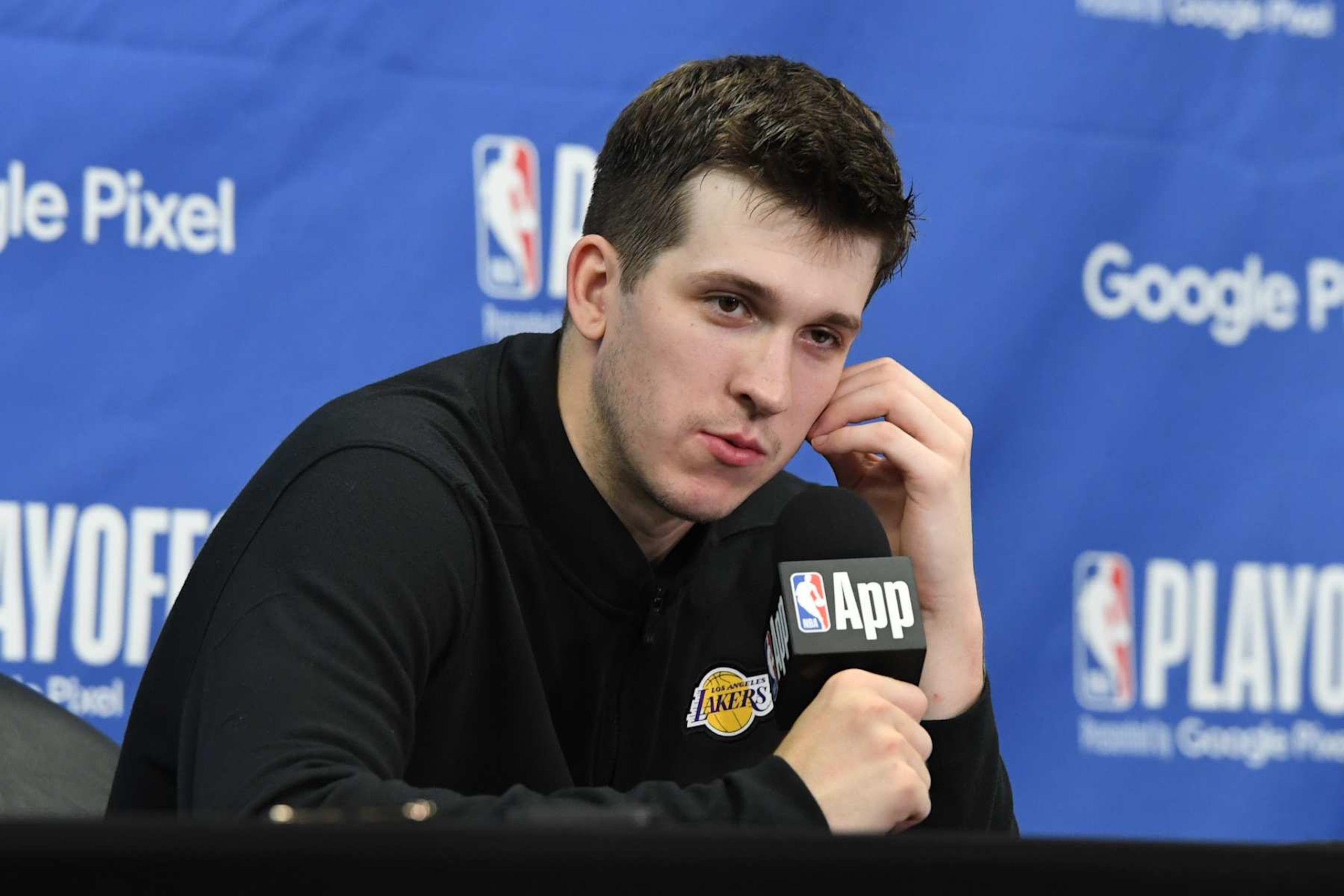 LOS ANGELES, CA - APRIL 27: Austin Reaves #15 of the Los Angeles Lakers talks to the media after the game against the Denver Nuggets during Round 1 Game 4 of the 2024 NBA Playoffs on April 27, 2024 at Crypto.Com Arena in Los Angeles, California. NOTE TO USER: User expressly acknowledges and agrees that, by downloading and/or using this Photograph, user is consenting to the terms and conditions of the Getty Images License Agreement. Mandatory Copyright Notice: Copyright 2024 NBAE (Photo by Andrew D. Bernstein/NBAE via Getty Images)
