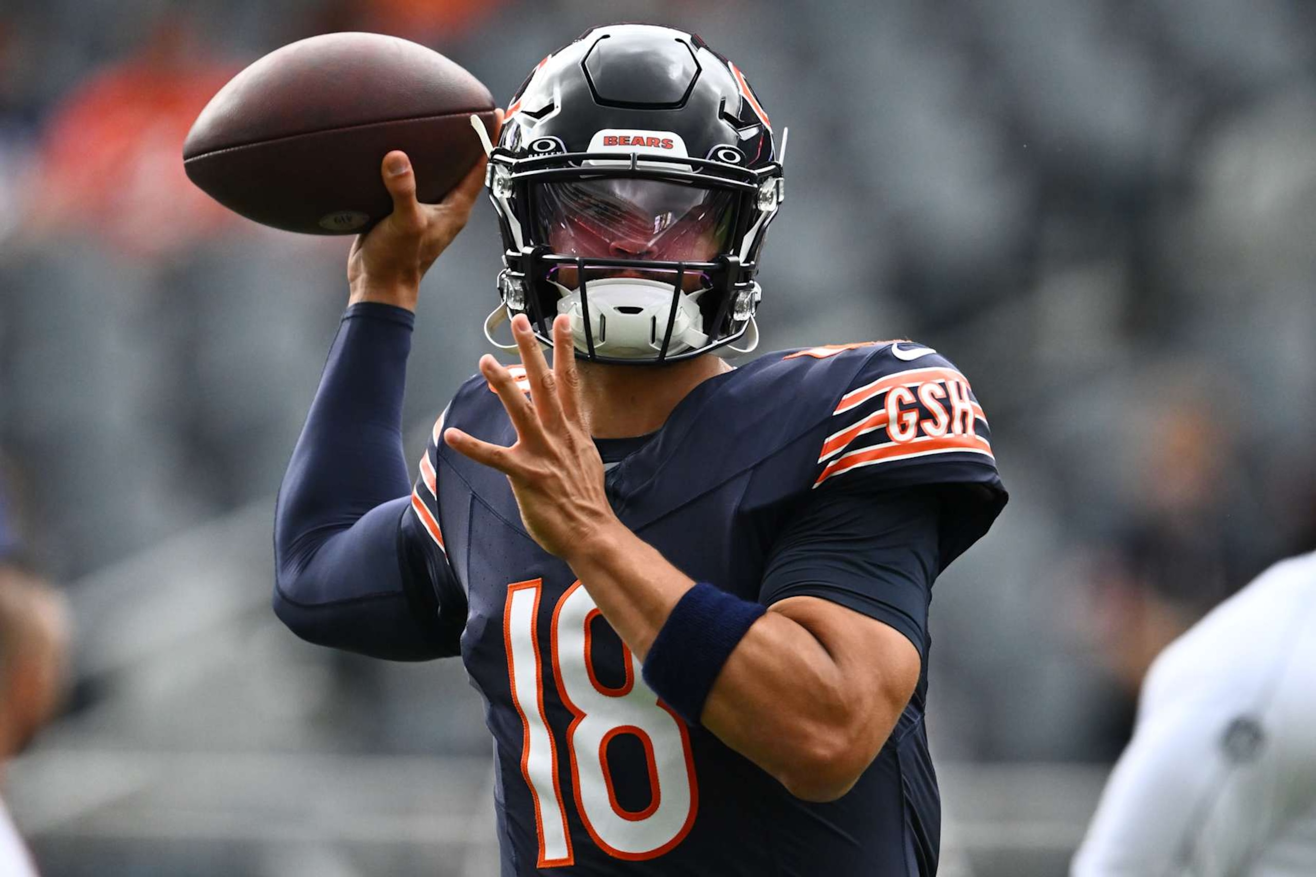 CHICAGO, ILLINOIS - AUGUST 17: Caleb Williams #18 of the Chicago Bears warms up before a preseason game against the Cincinnati Bengals at Soldier Field on August 17, 2024 in Chicago, Illinois. (Photo by Quinn Harris/Getty Images)