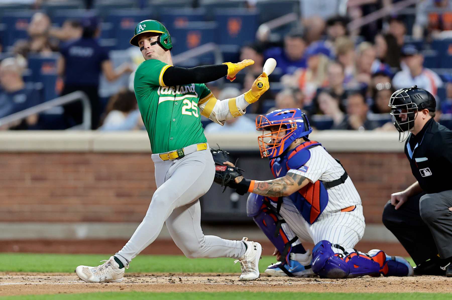 NEW YORK, NEW YORK - AUGUST 13:  Brent Rooker #25 of the Oakland Athletics in action against the New York Mets at Citi Field on August 13, 2024 in New York City. The Athletics defeated the Mets 9-4. (Photo by Jim McIsaac/Getty Images)