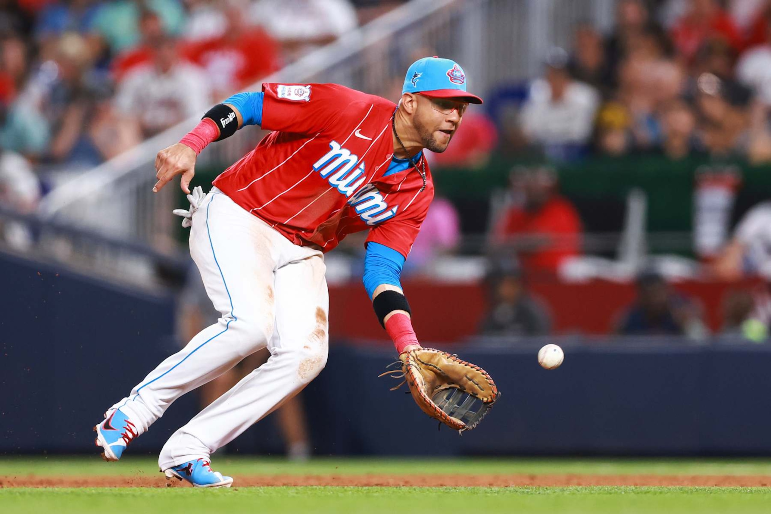 MIAMI, FLORIDA - SEPTEMBER 16: Yuli Gurriel #10 of the Miami Marlins fields a ground ball against the Atlanta Braves during the seventh inning at loanDepot park on September 16, 2023 in Miami, Florida. (Photo by Megan Briggs/Getty Images)