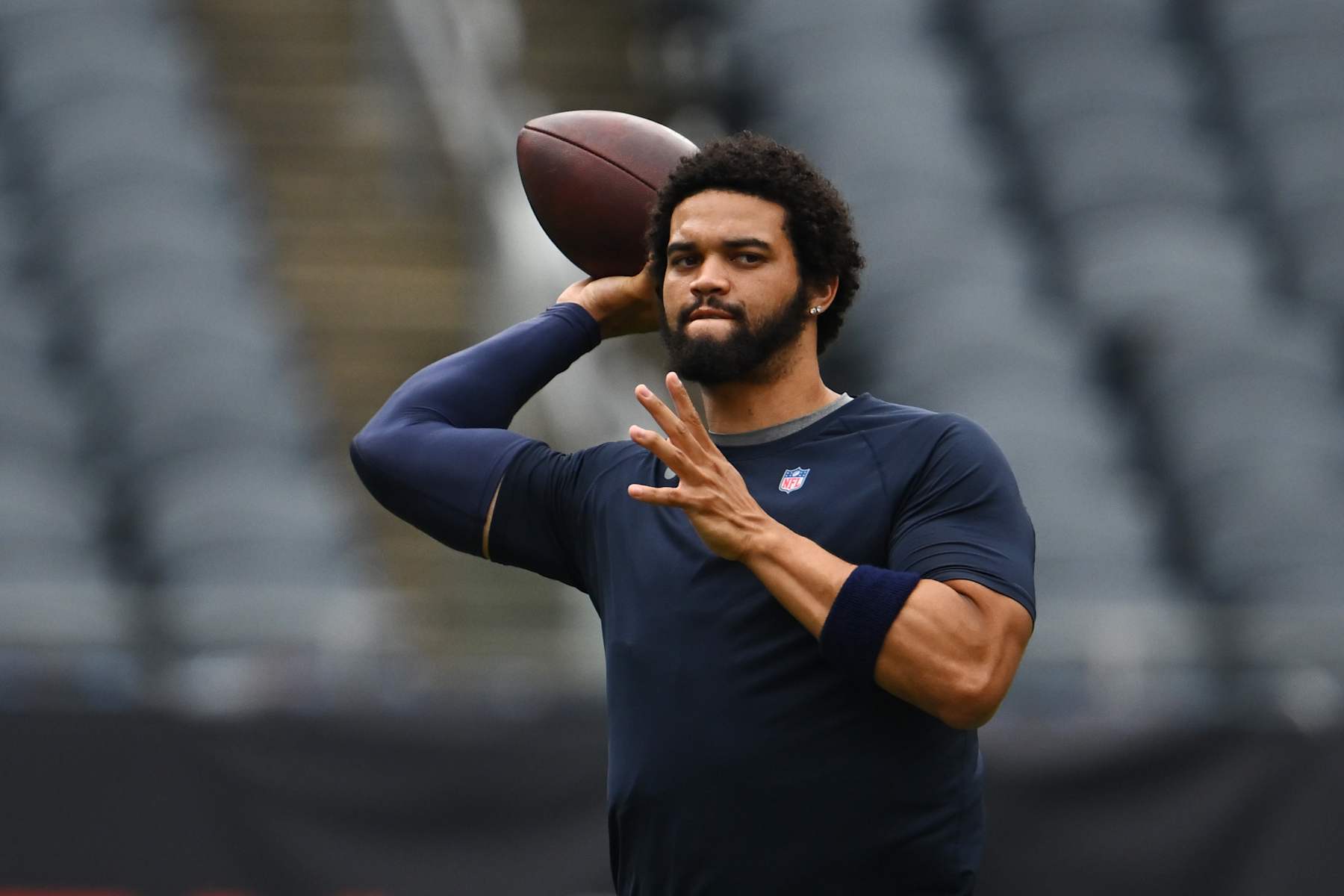 CHICAGO, ILLINOIS - AUGUST 17: Caleb Williams #18 of the Chicago Bears warms up before a preseason game against the Cincinnati Bengals at Soldier Field on August 17, 2024 in Chicago, Illinois. (Photo by Quinn Harris/Getty Images)